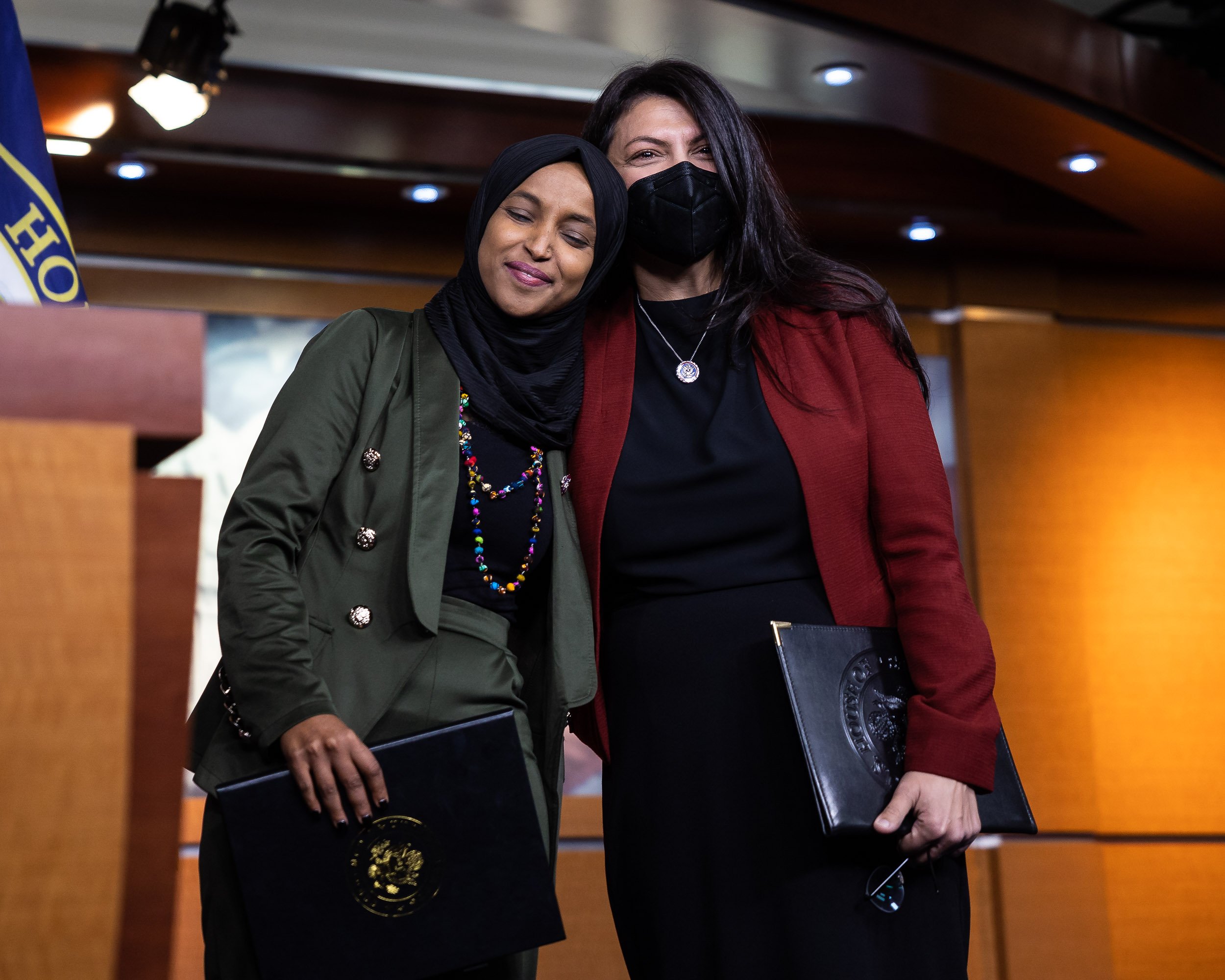  Reps. Ilhan Omar (D-Minn.) and Rashida Tlaib (D-Mich.) embrace during a press conference on Islamophobia on Capitol Hill Nov. 30, 2021. 