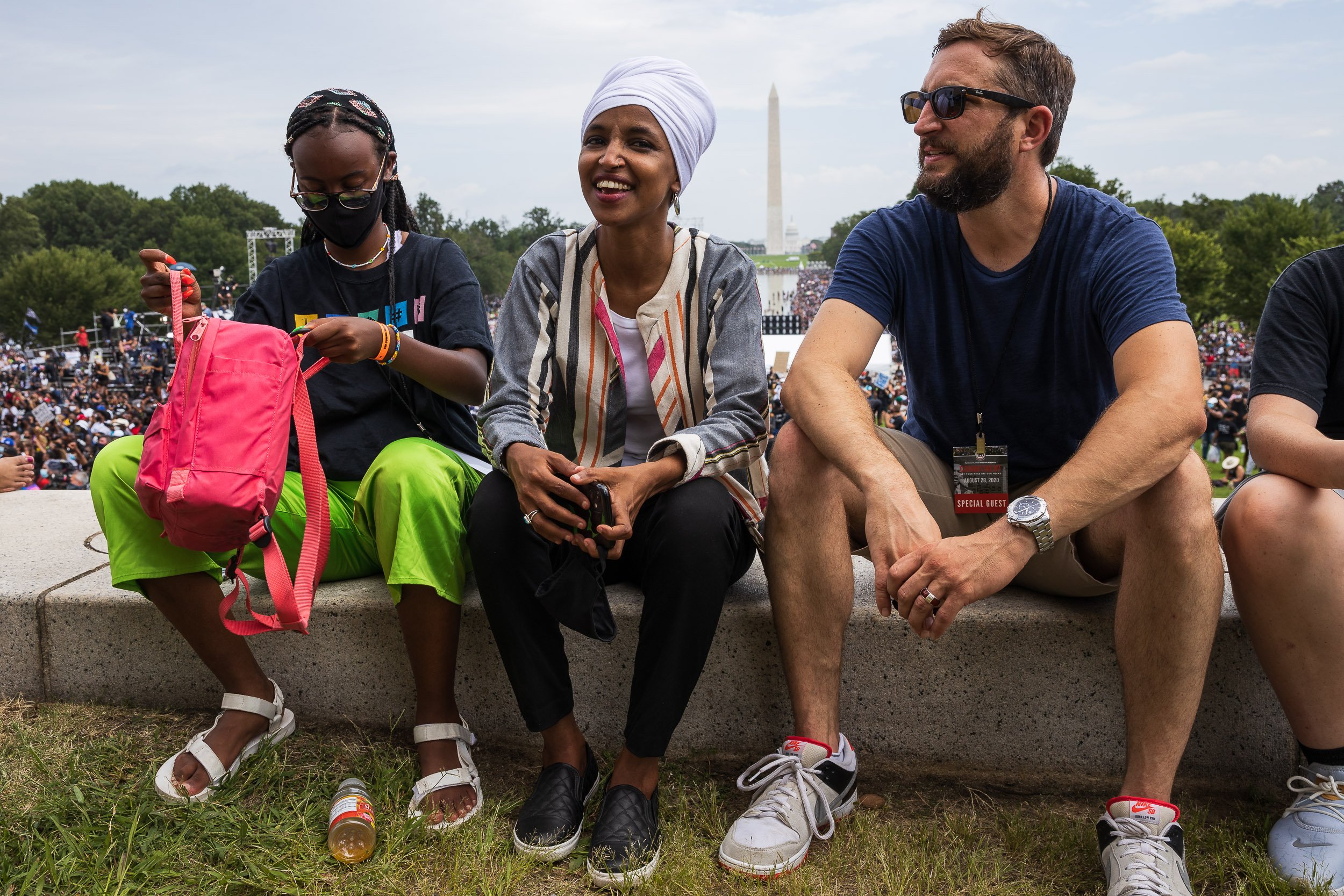  Rep. Ilhan Omar (D-Minn.) flanked by her daughter Isra Hirsi and husband Tim Mynett at the Commitment March on Washington Aug. 28, 2020. 