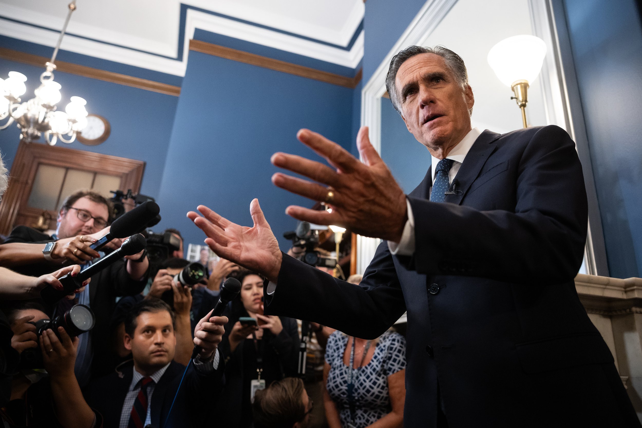  Sen. Mitt Romney (R-Utah) speaks with reporters in his office on Capitol Hill Sept. 13, 2023 after announcing that he will not seek reelection. 