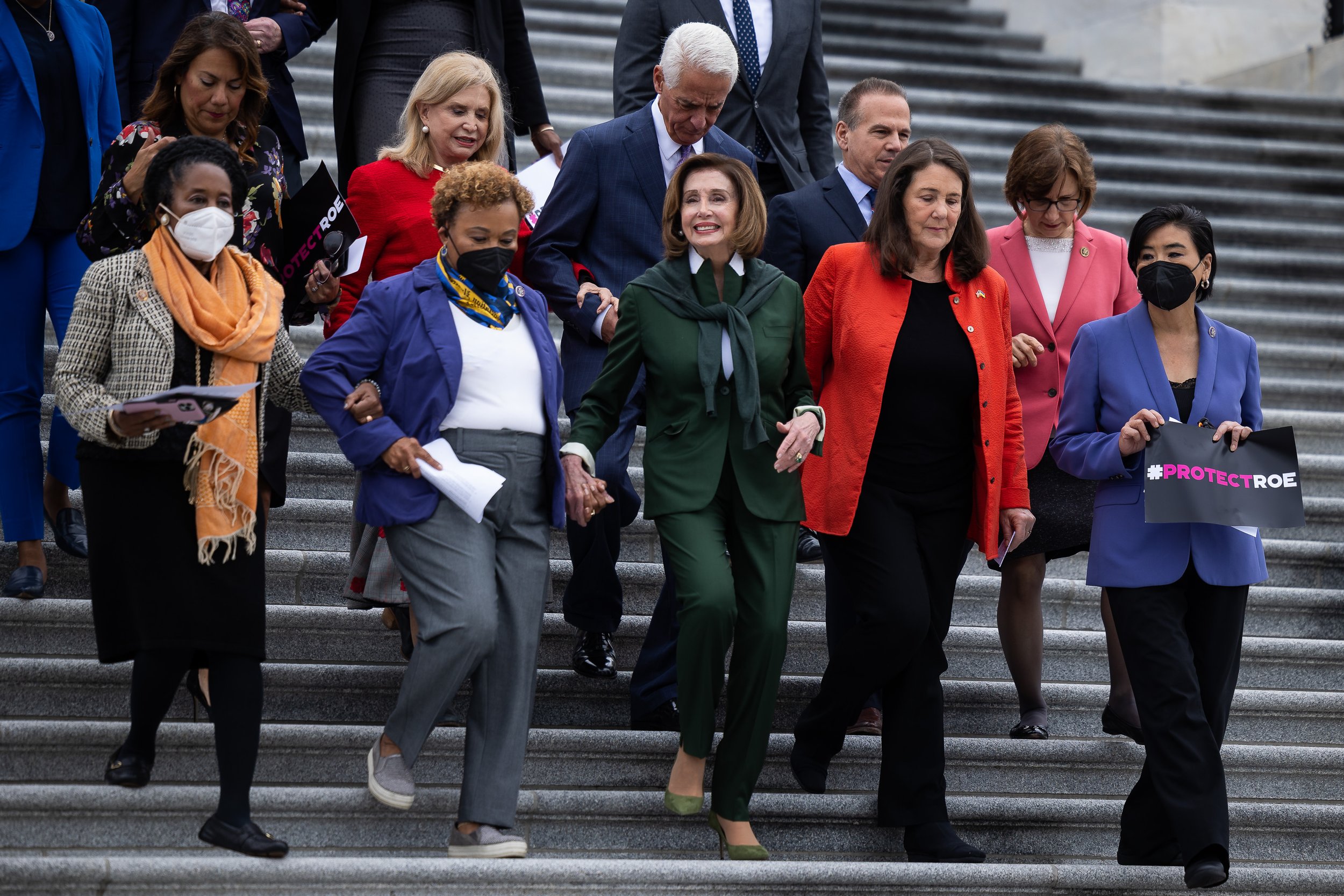 House Speaker Nancy Pelosi (D-Calif.) and other House Democrats arrive for a press conference in response to the leaked Supreme Court draft opinion that indicated the court was poised to overturn Roe v. Wade outside the U.S. Capitol May 13, 2022.