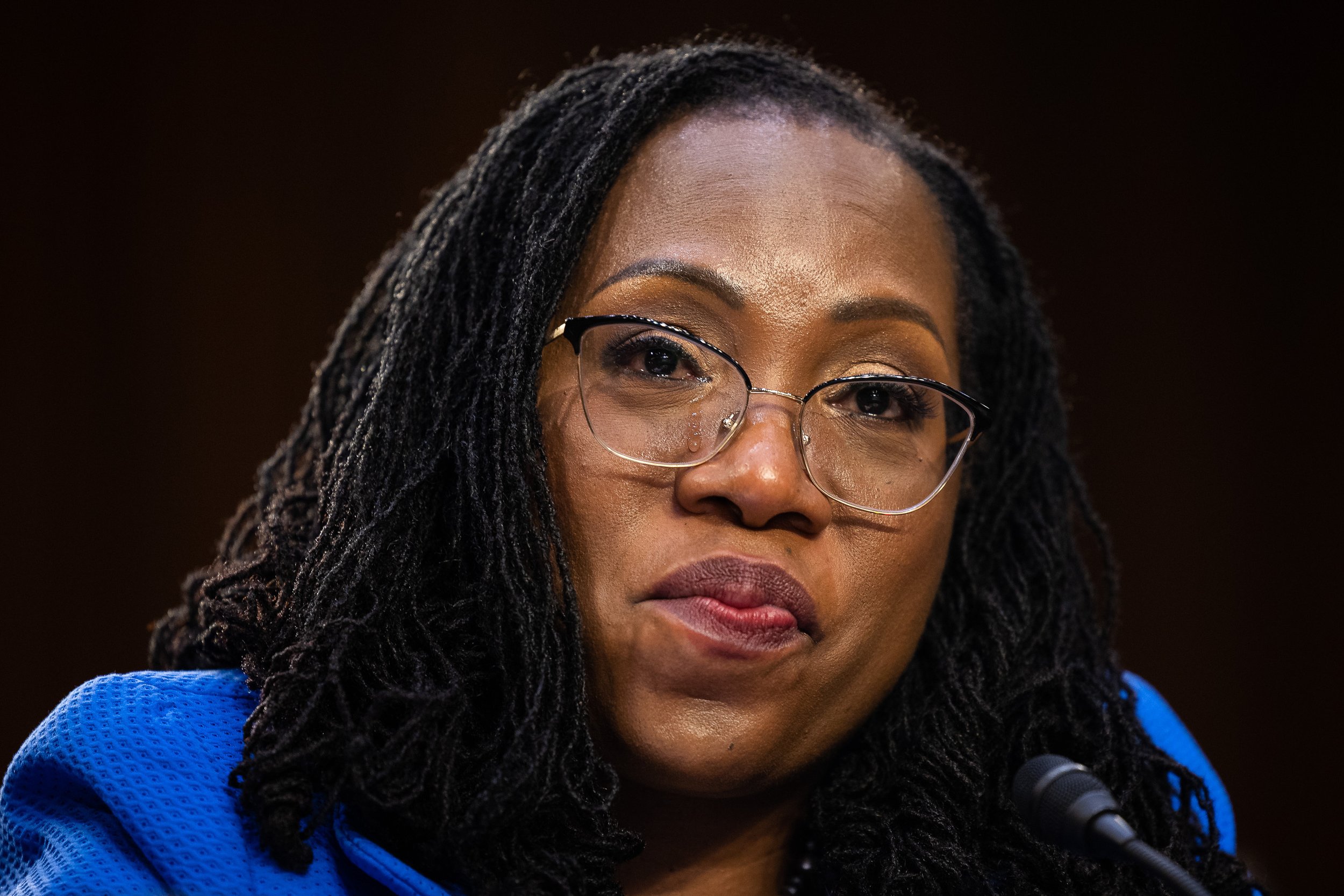 Supreme Court nominee Ketanji Brown Jackson tears up while a senator discusses the historic nature of her candidacy during her confirmation hearing on Capitol Hill March 23, 2022.