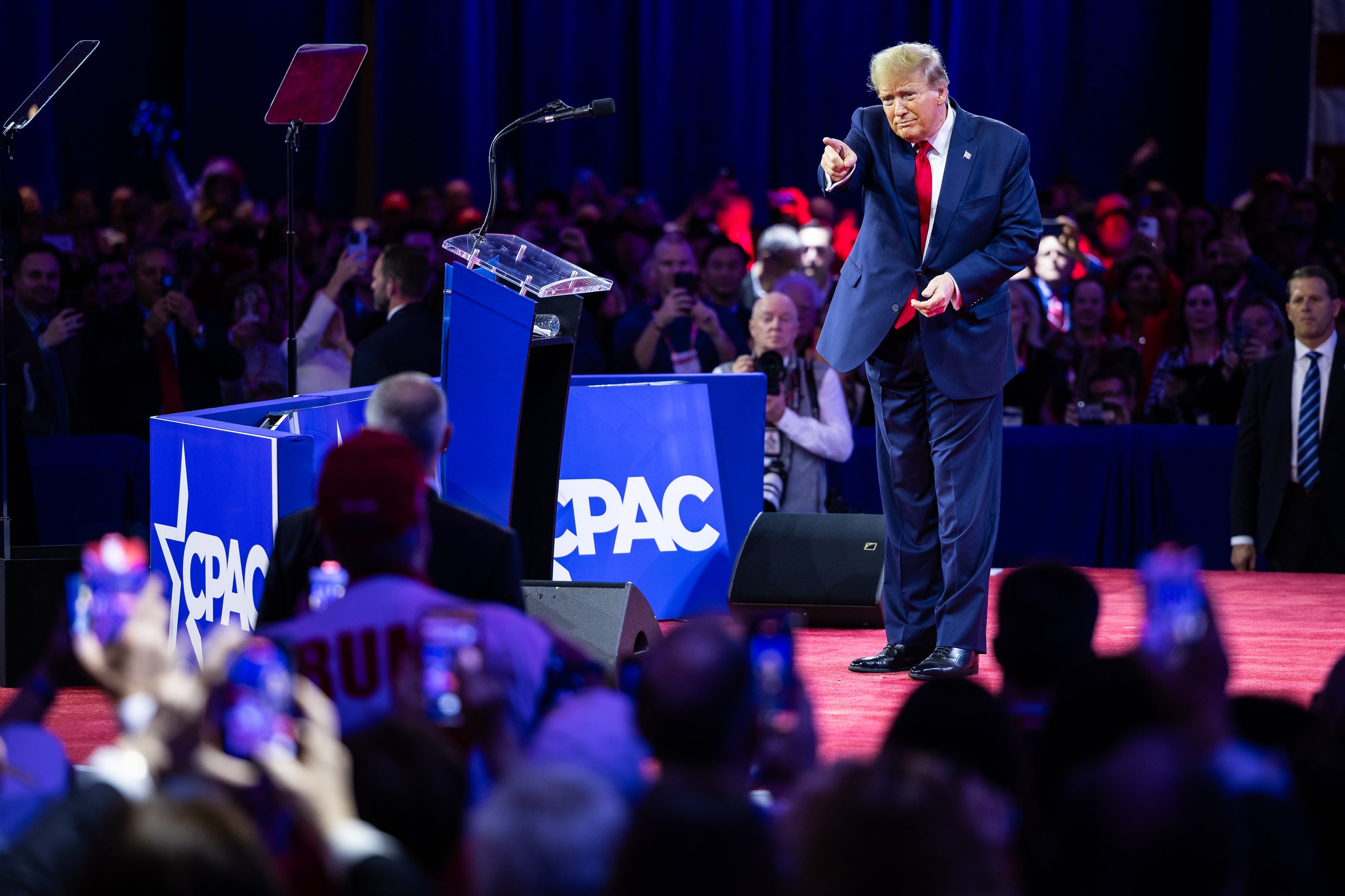  Former President Donald Trump gestures as he departs after delivering remarks during the Conservative Political Action Conference (CPAC) at the Gaylord National Resort and Convention Center in National Harbor, Md., Feb. 24, 2024. 