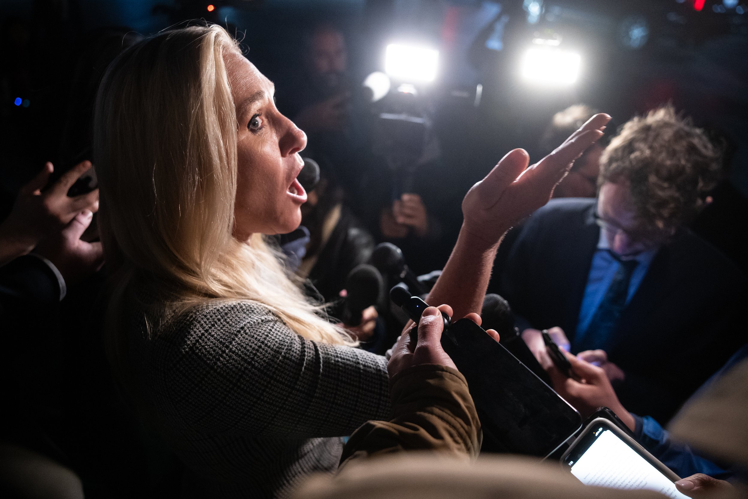  Rep. Marjorie Taylor Greene (R-Ga.) speaks with reporters outside the U.S. Capitol after the House passed two articles of impeachment against Homeland Security Secretary Alejandro Mayorkas Feb. 13, 2024.  