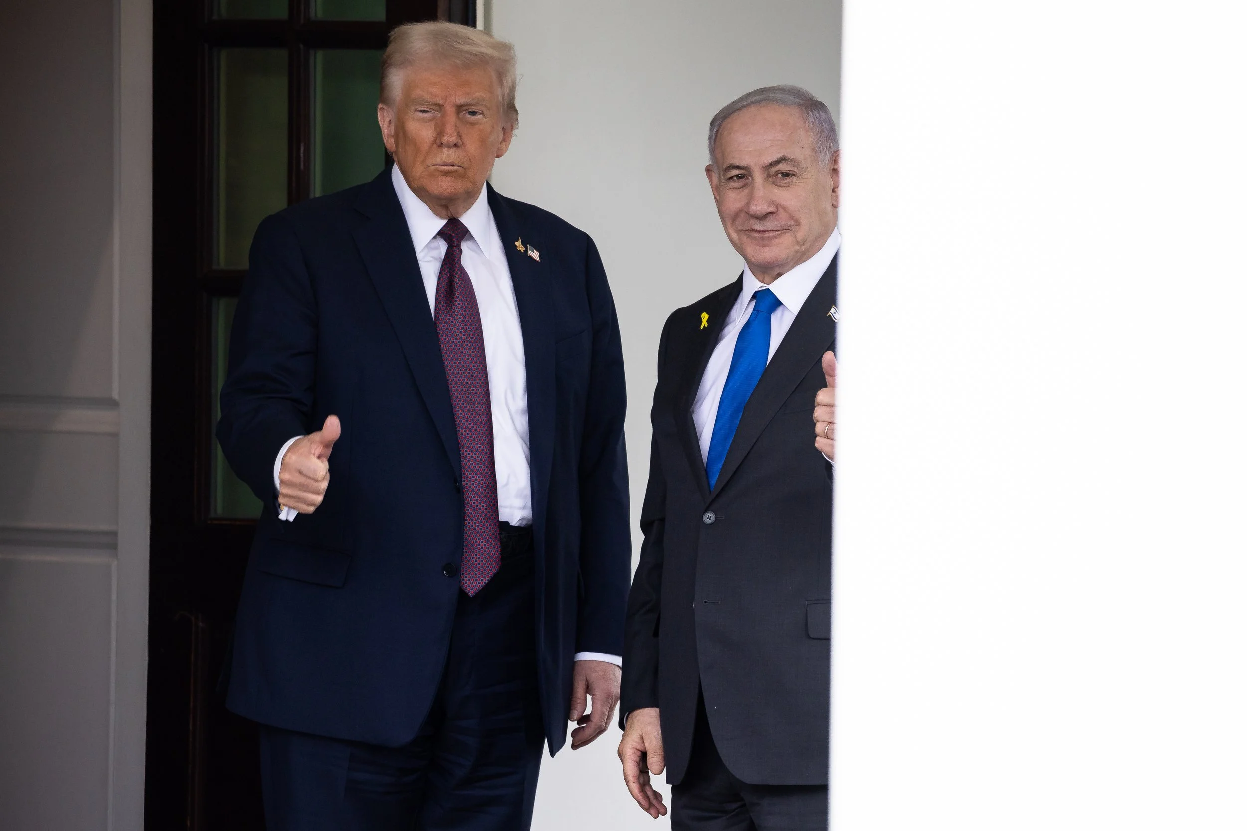  President Donald Trump greets Israeli Prime Minister Benjamin Netanyahu ahead of a meeting at the White House Sept. 29, 2025. 