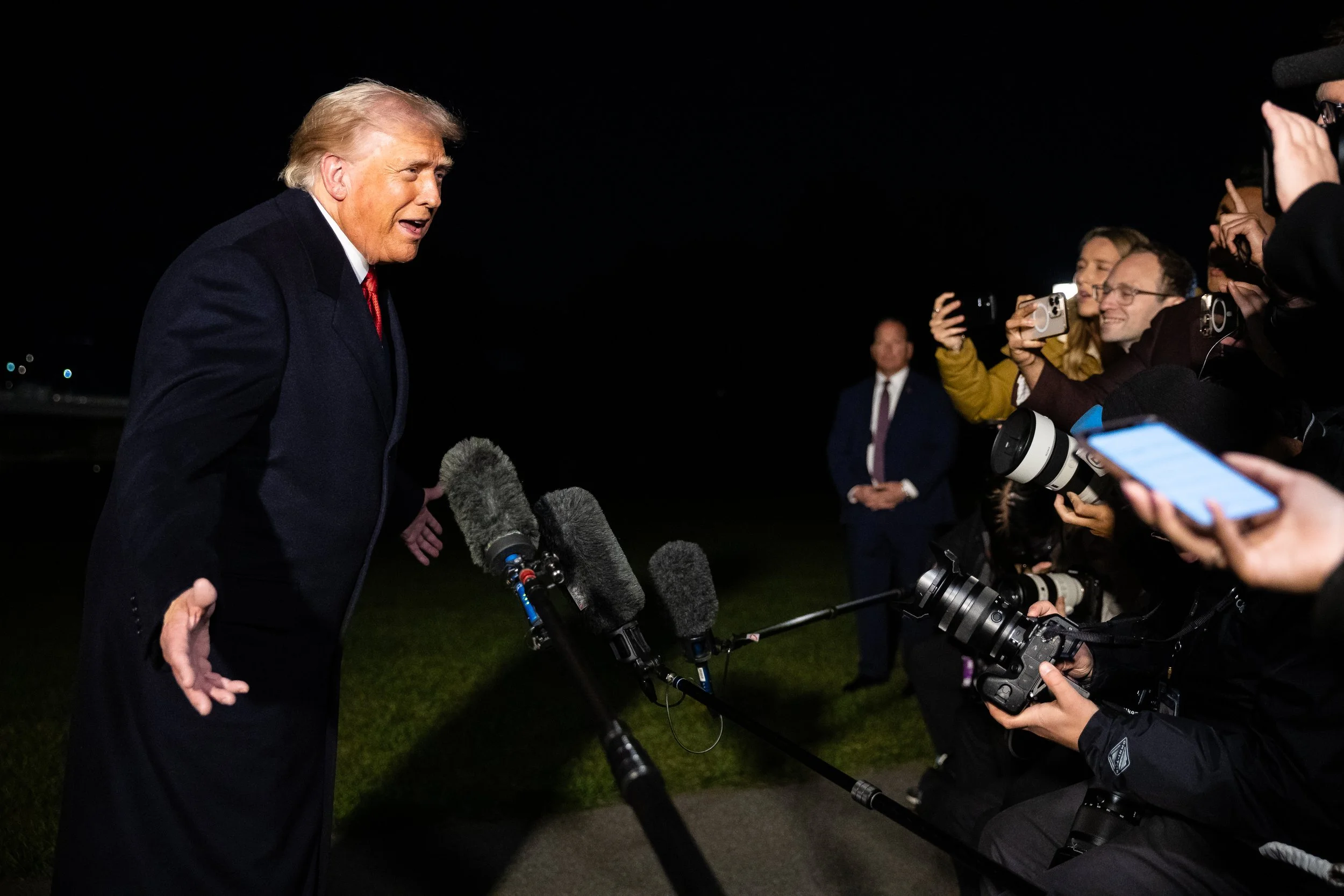  President Donald Trump speaks with reporters as he departs on the South Lawn of the White House to board Marine One, Oct. 24, 2025.  