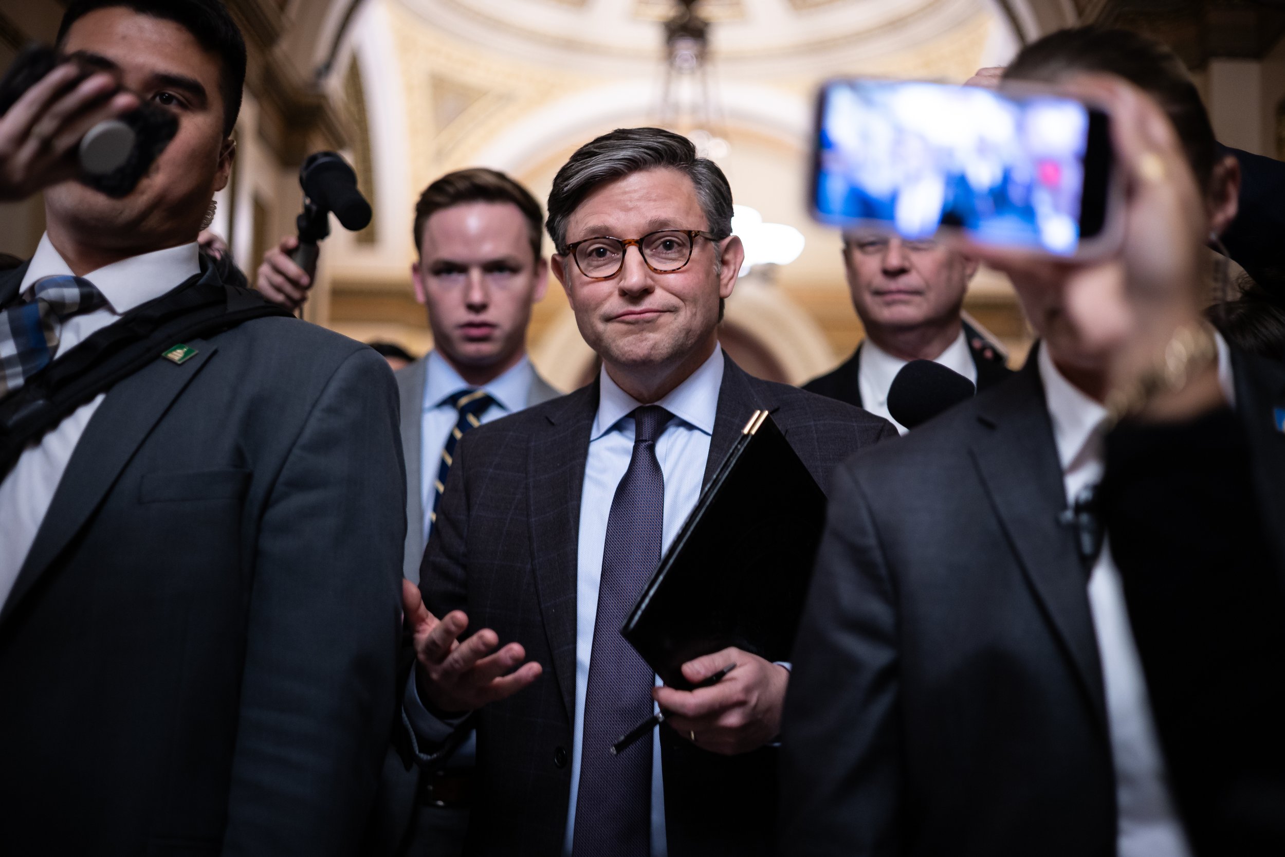  House Speaker Mike Johnson (R-La.) speaks with reporters as he departs a vote at the U.S. Capitol Dec. 3, 2025.  