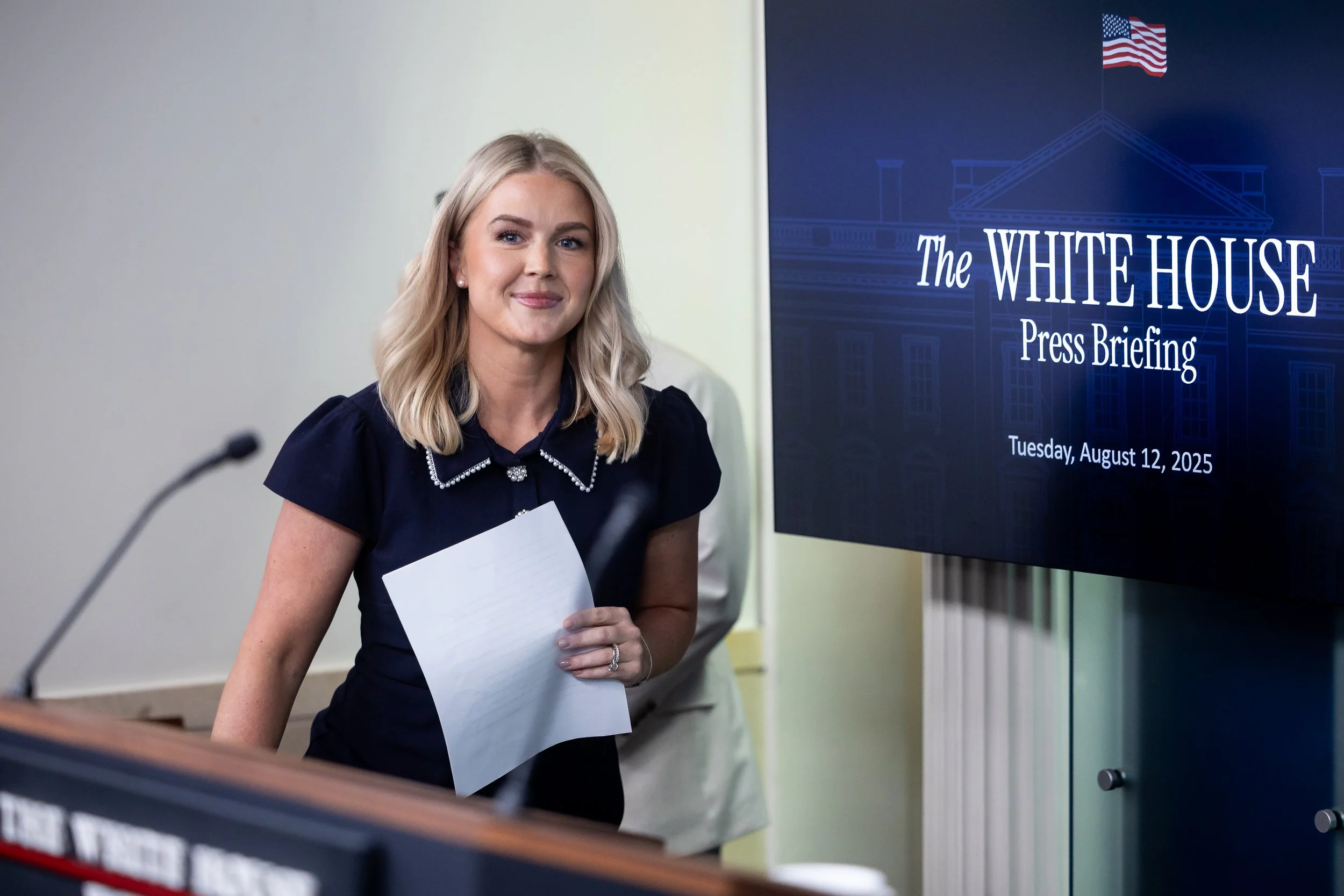  White House Press Secretary Karoline Leavitt arrives for a press briefing at the White House Aug. 12, 2025.  