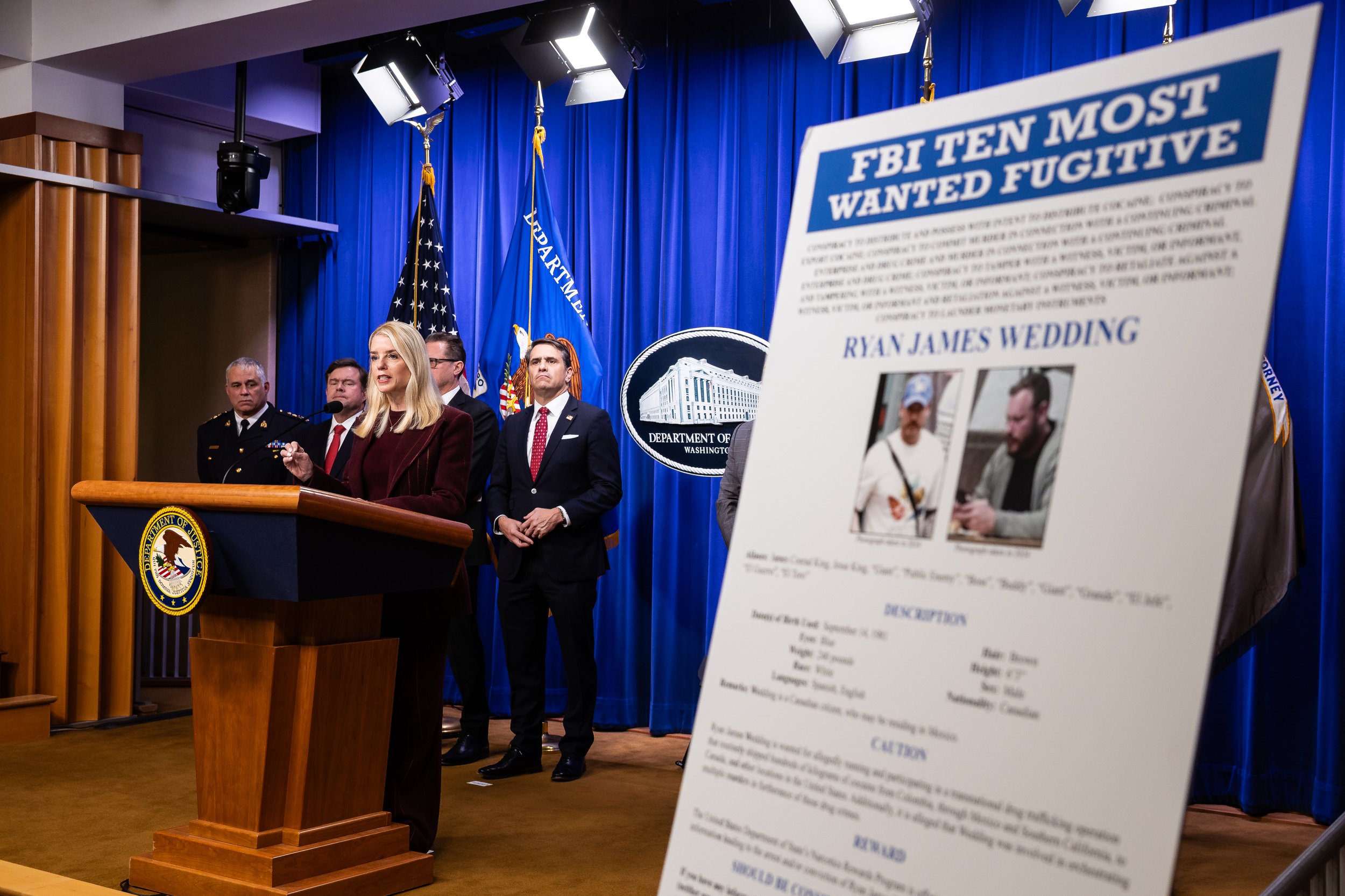  Attorney General Pam Bondi speaks alongside other U.S. and Canadian officials during the announcement of a reward for alleged drug smuggler Ryan James Wedding at Department of Justice headquarters in Washington, D.C., Nov. 19, 2025. 
