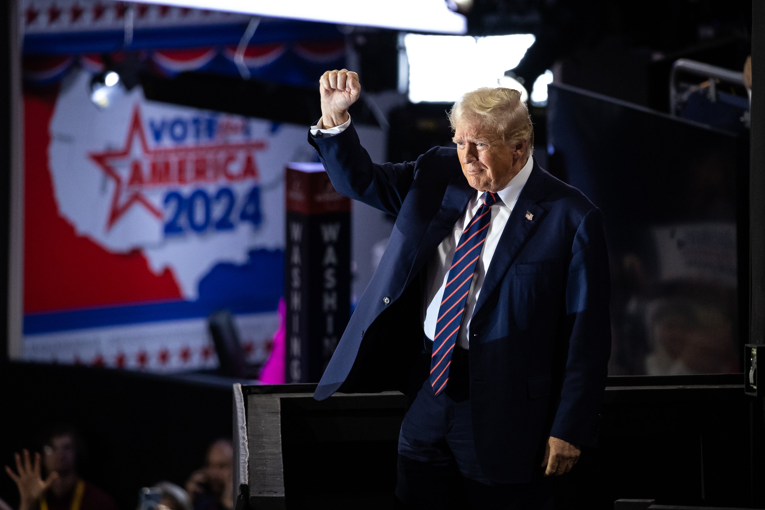  Former President Donald Trump gestures to supporters as he arrives for the third night of the Republican National Convention at Fiserv Forum in Milwaukee, Wis., July 17, 2024.  