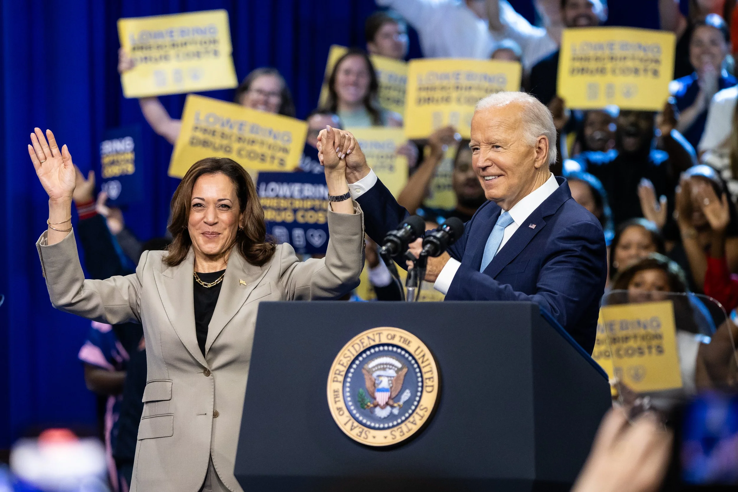  Vice President Kamala Harris and President Joe Biden are seen during an event on lowering drug costs at Prince George's Community College in Largo, Md., Aug. 15, 2024. 