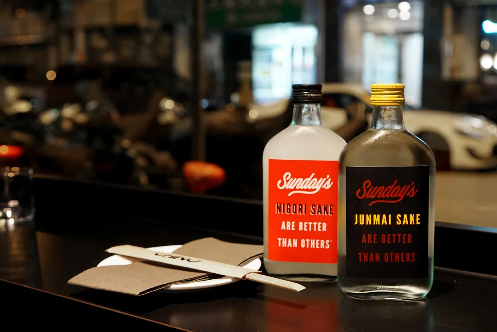 Everyone has been asking us for sake and we heard you!!! We have partnered up with our friends at Sunday's Grocery to bring you their house Junmai and Nigori sake. Cheers!