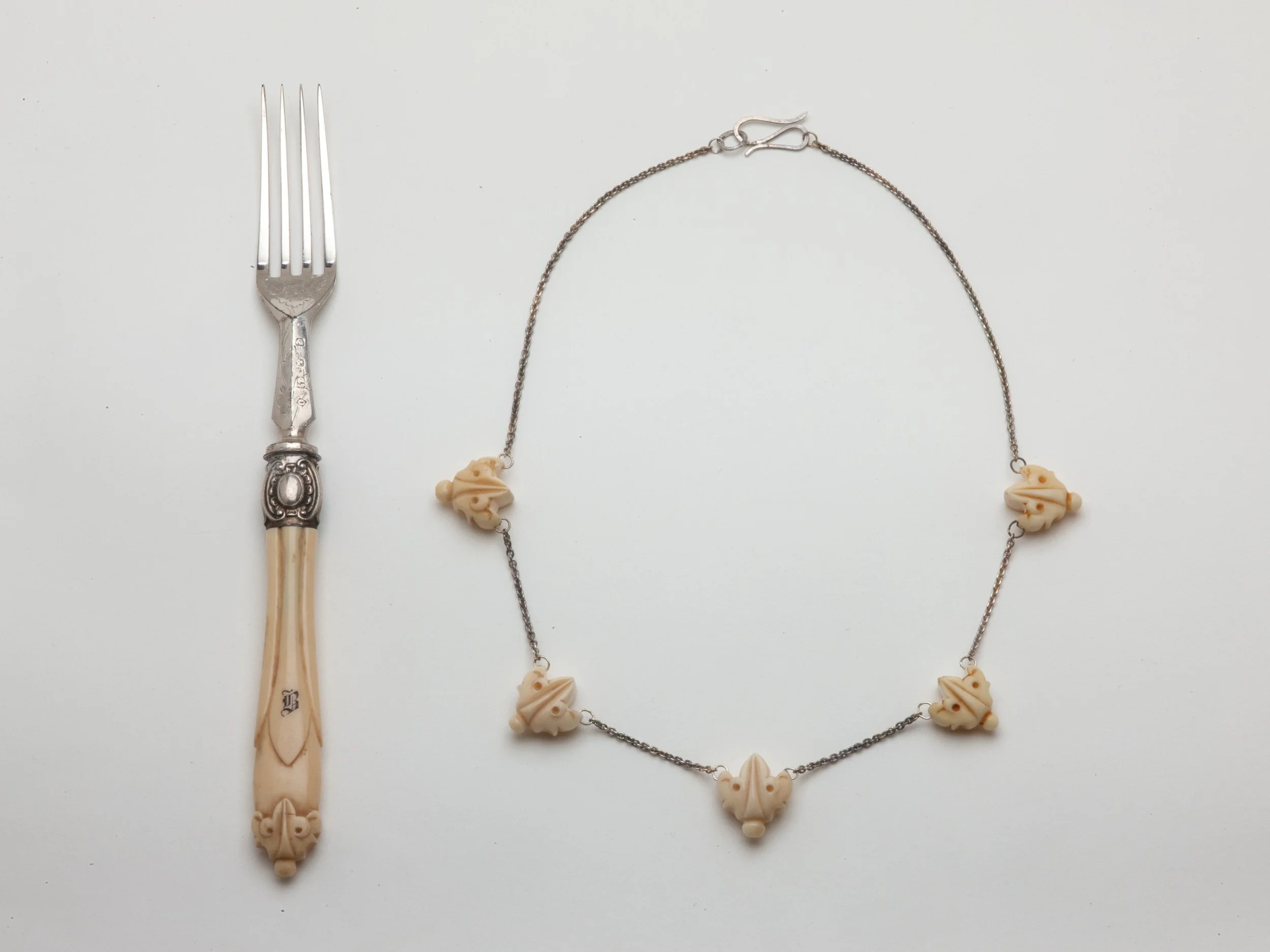 Gargoyle Necklace with fork.jpg