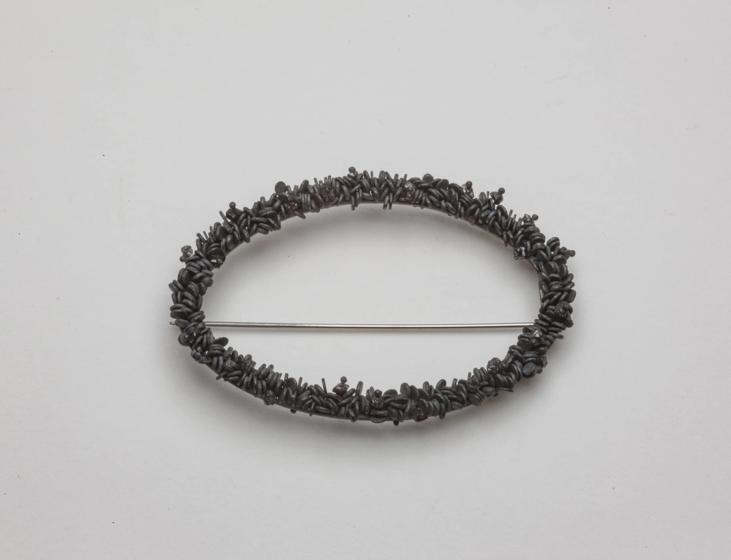 Oval Weed Brooch with Rough Black Diamonds_2025_1.jpg