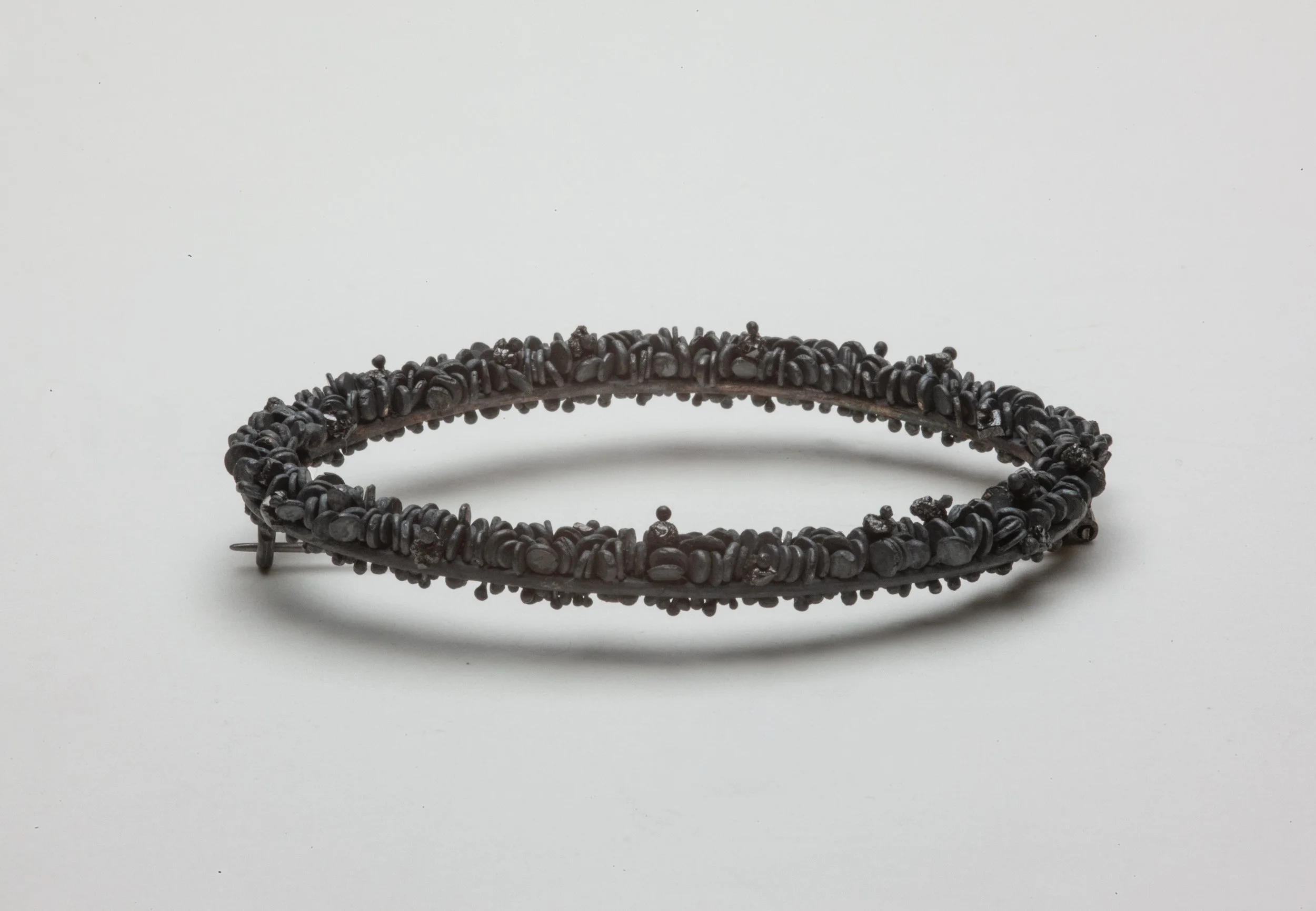 Oval Weed Brooch with Rough Black Diamonds_2025_2.jpg