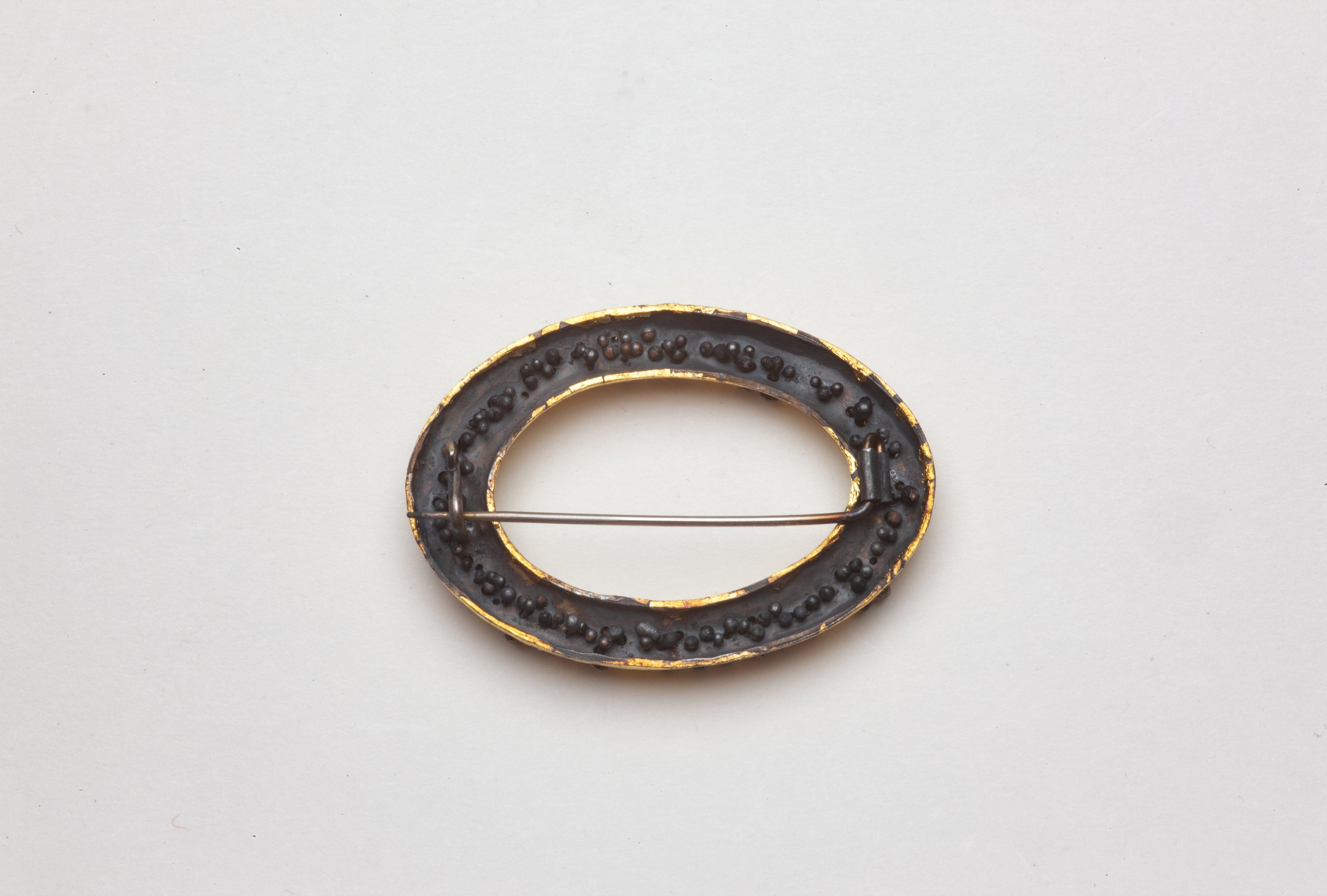 Golden Oval with Shingle 2026 1.jpg