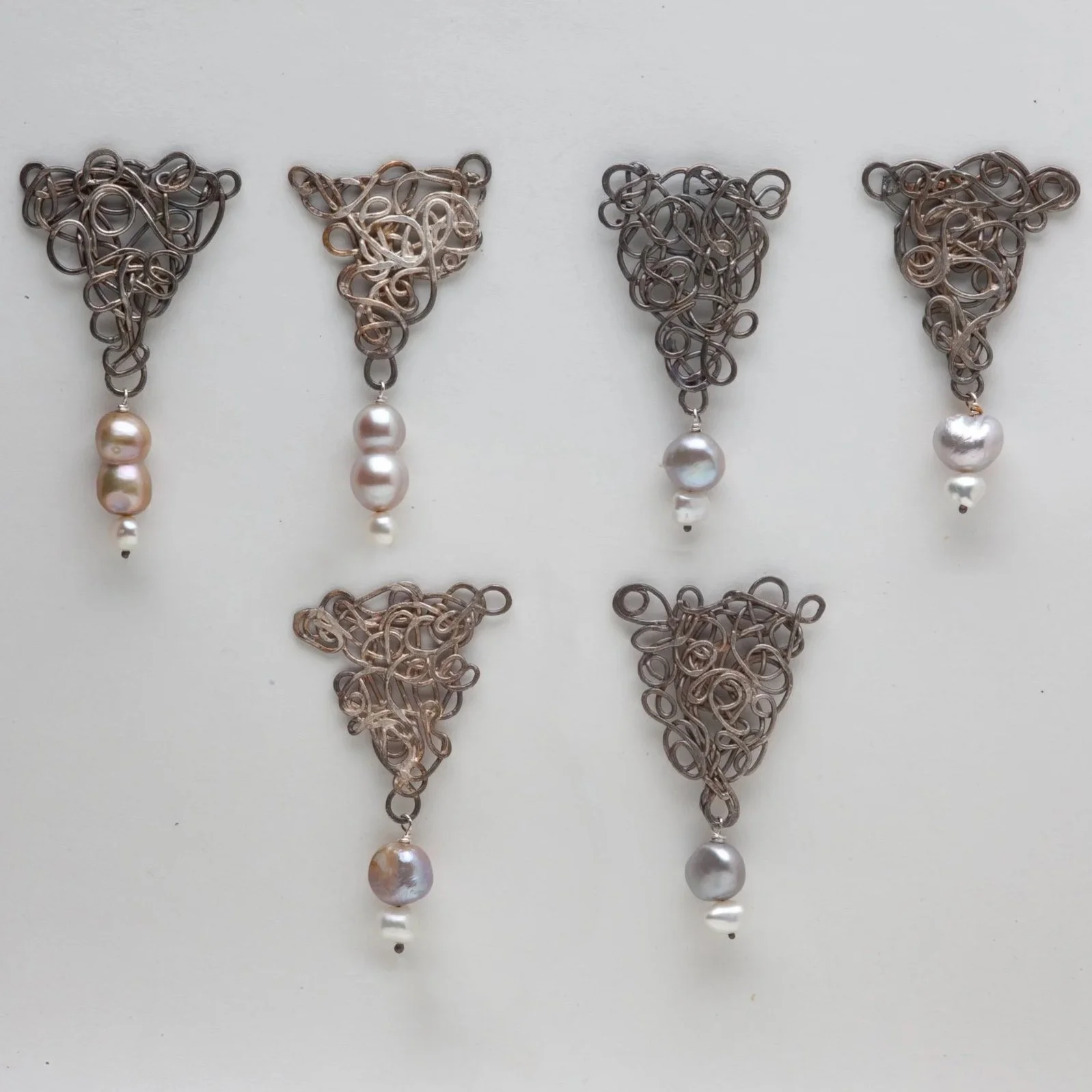 Calligraphic+earrings+2025.jpg