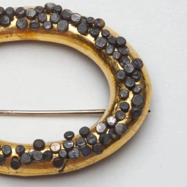 Golden+Oval+with+Shingle+2026.jpg