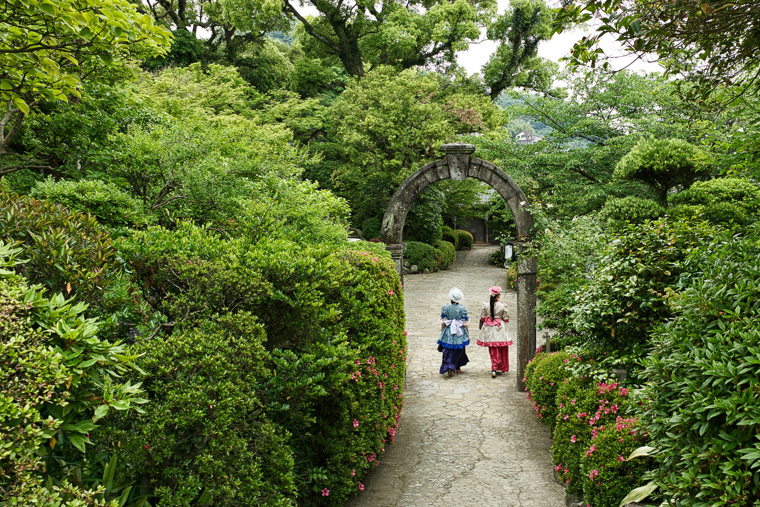 Two colonial ladies walking at Glover Garden, nice time slip.