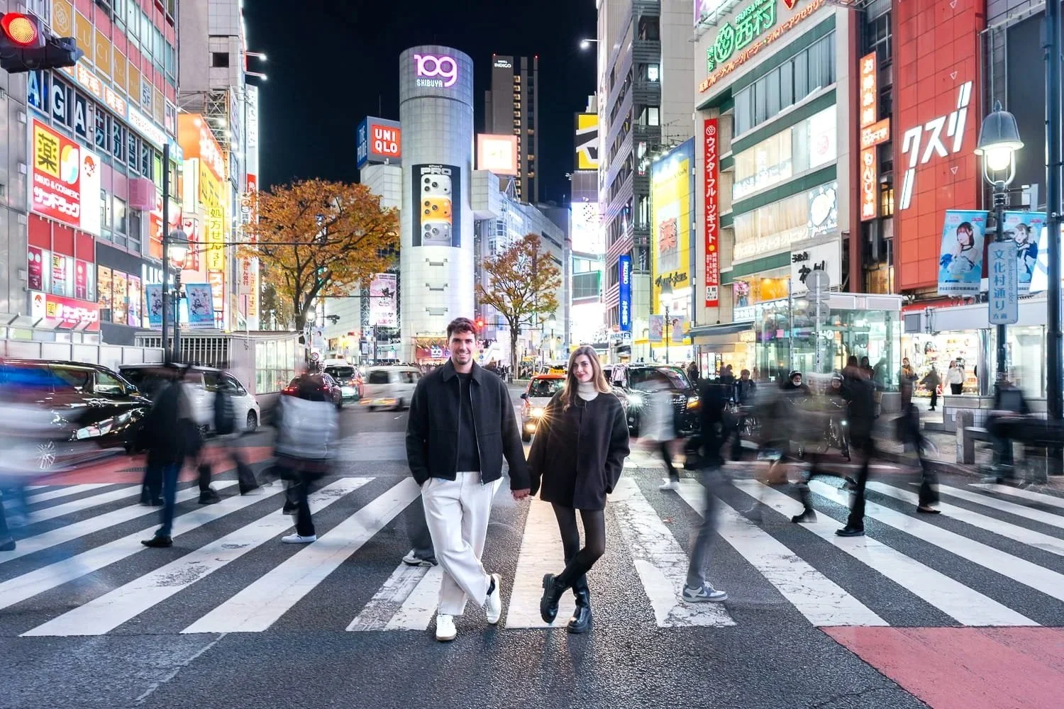Shibuya Scramble night photoshoot for couples who enjoy neon streets and vibrant city background