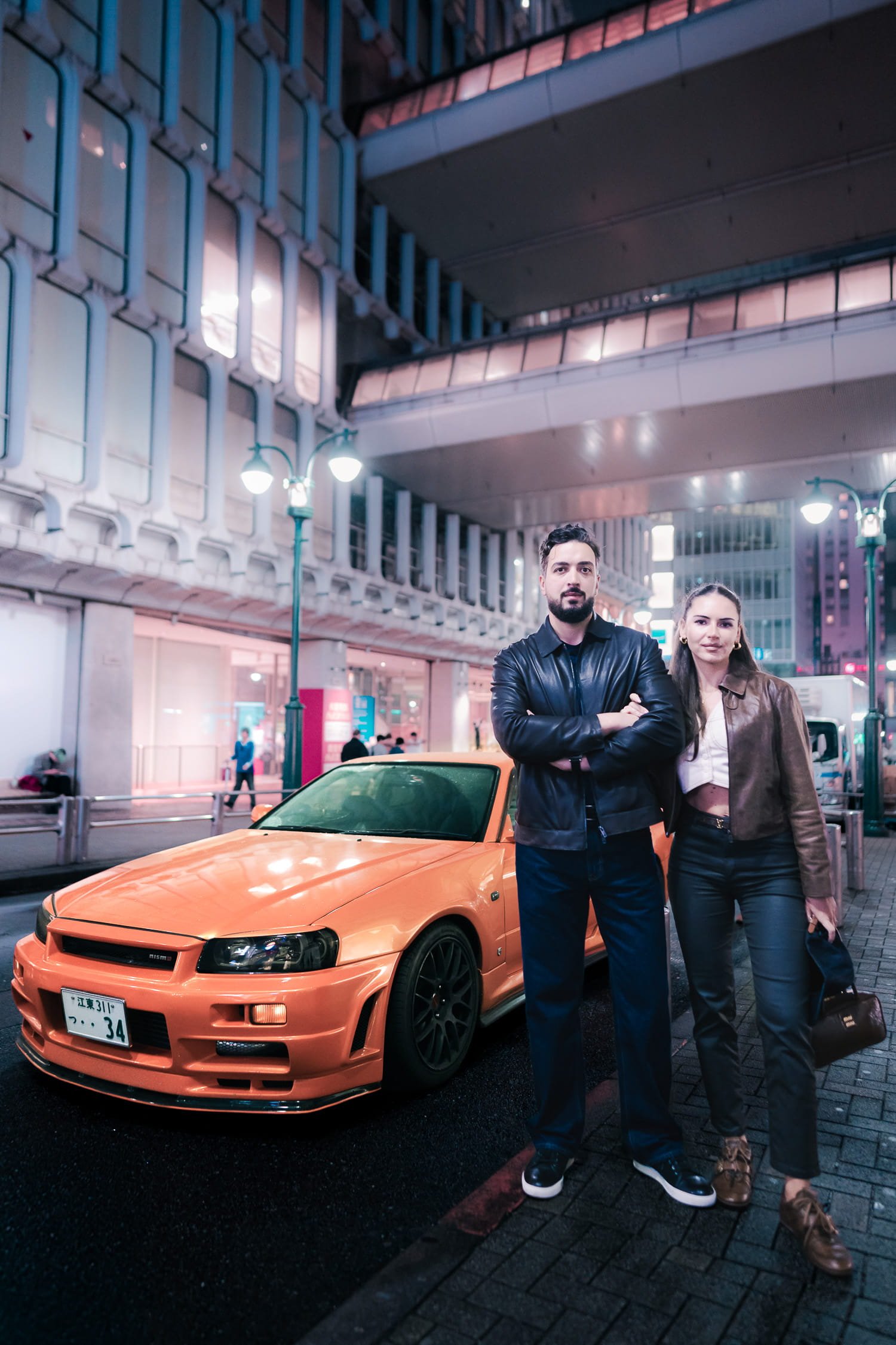 Evening street photoshoot around Shibuya area featuring Nissan Skyline in the scene resembling The Fast & Furious, Tokyo Drift movie