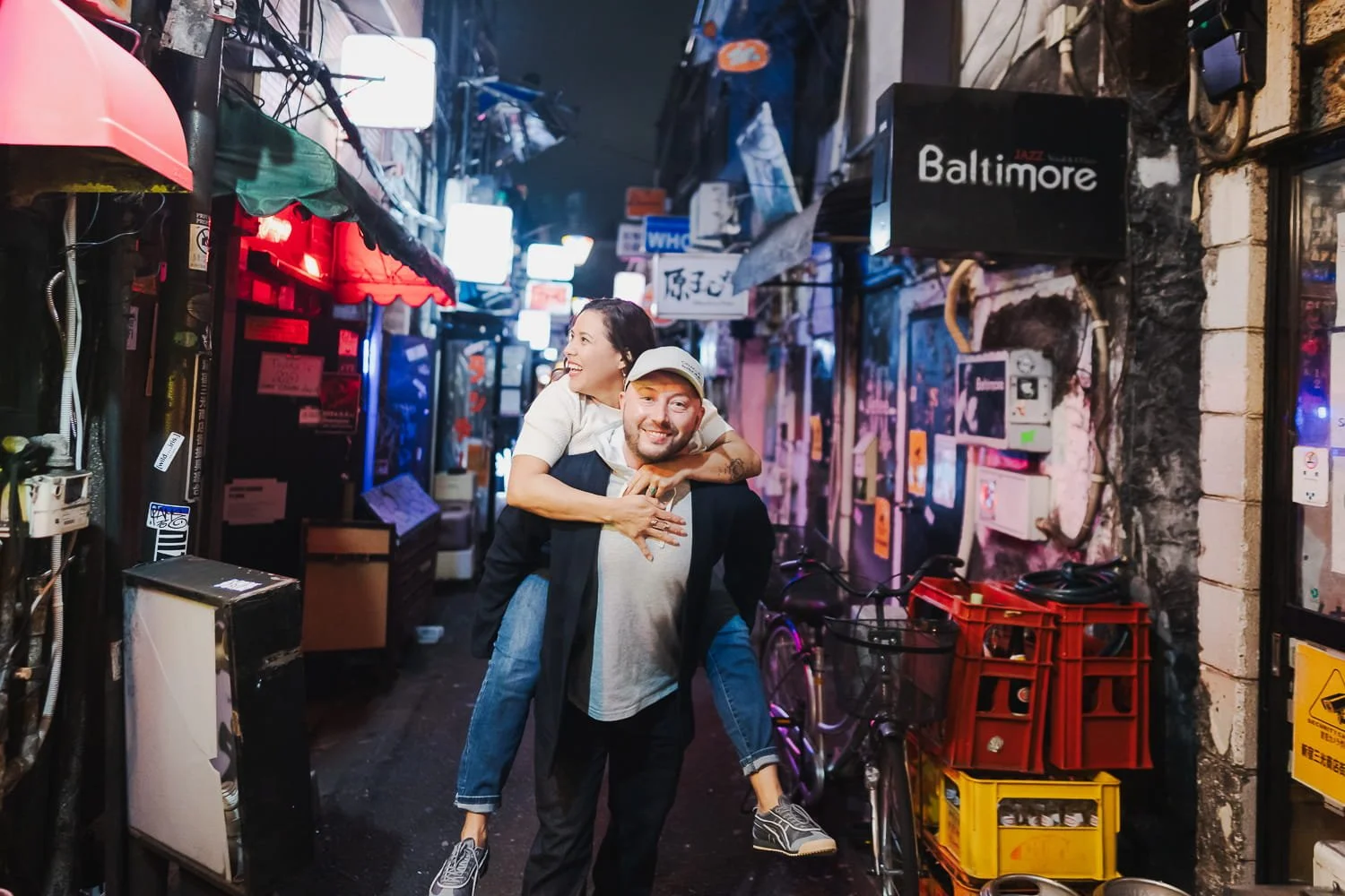 Tokyo unique experience in the maze-like bar area of Shinjuku Golden gai where the couple had a good time while being photographed