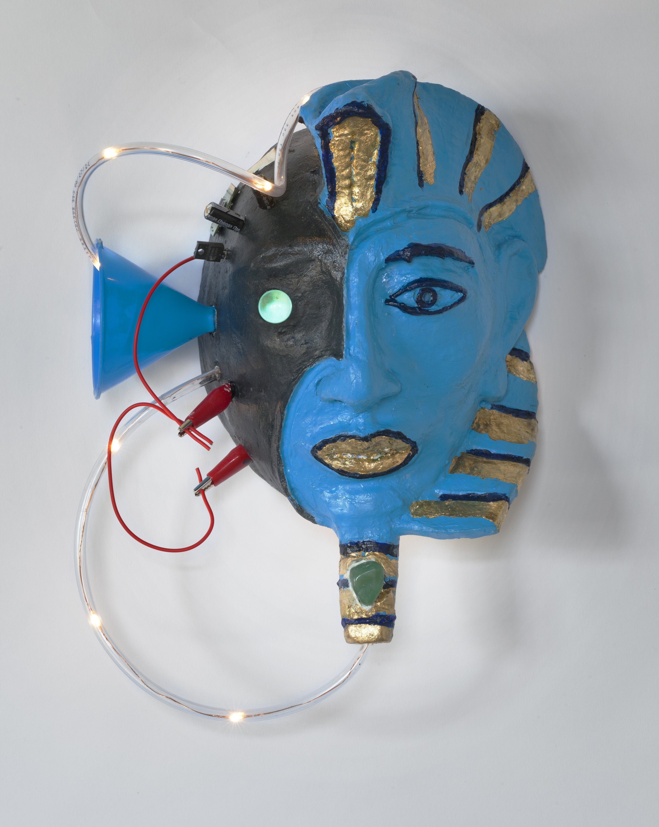   Cyborg  Clay, glaze, gold leaf, varnish, plastic tubing, marble, led lights, battery, electric clips, plastic funnel, and jade. 13 x 10.5 x 5.75 2022 