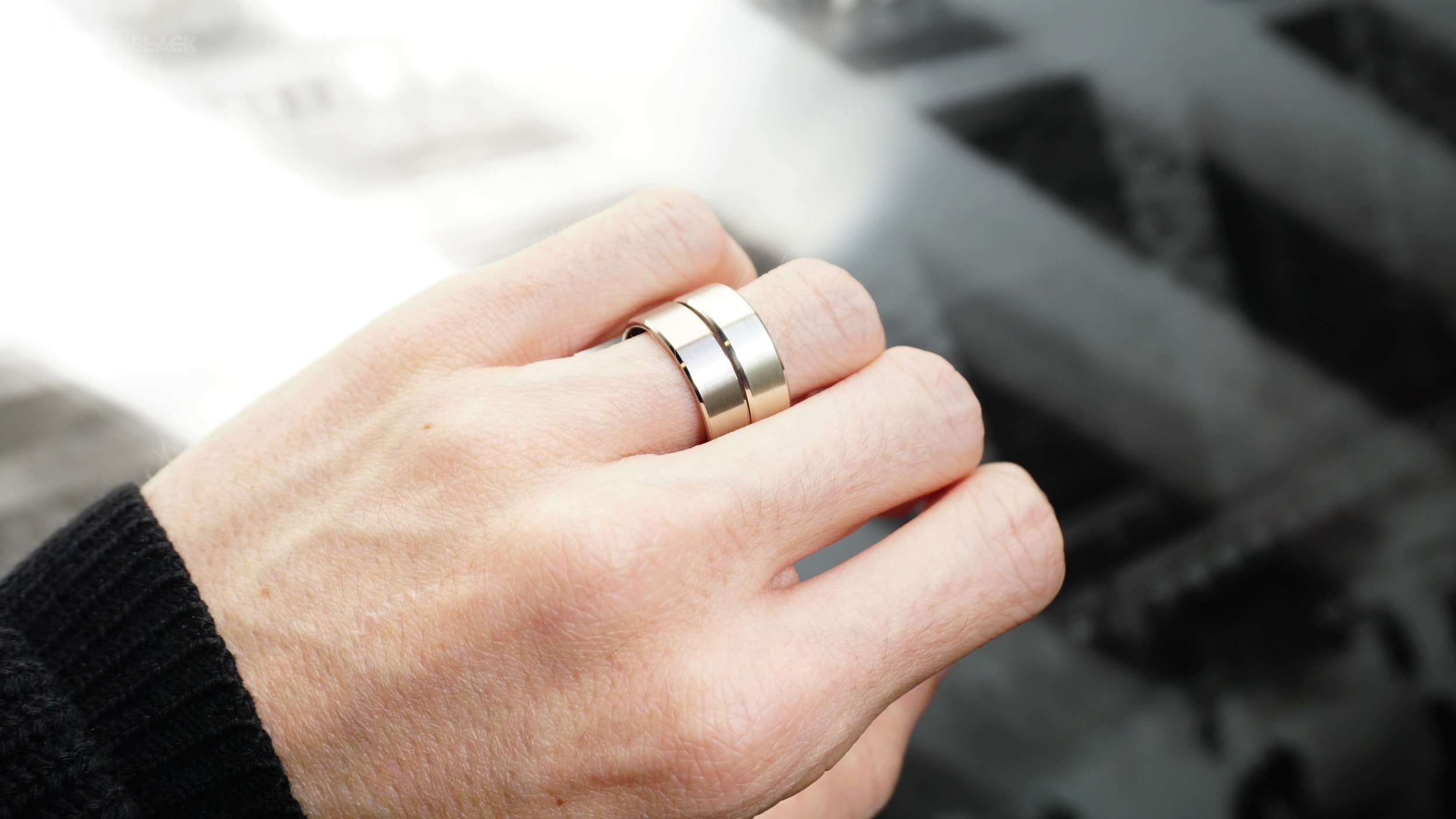 The ring on the left is our 18ct palladium white gold. On the right is our 9ct white gold.  Neither have any sort of coating or plating applied.