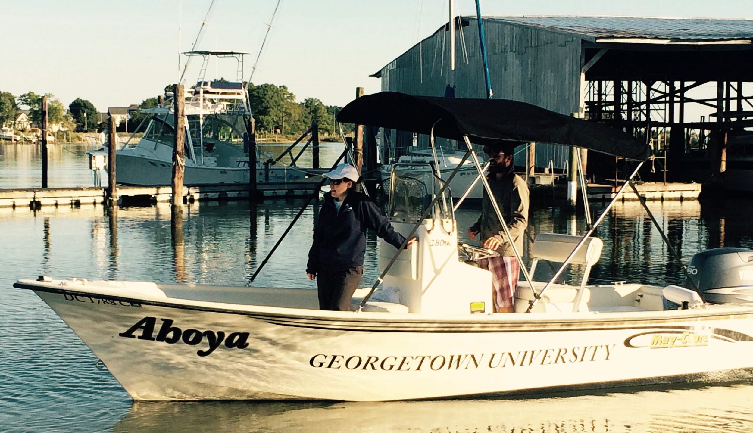 Meg Wallen (left) and Eric Patterson (right) heading out from Smith Point Marina to the study area to run transects. Photo by Desirae Cambrelen.
