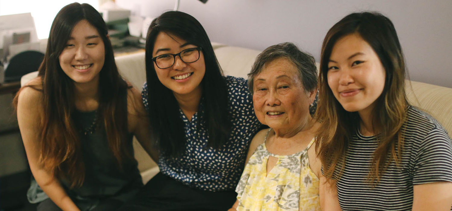 Director Fran Ito with Visual Communications summer interns (from left): Connie Oh, Farrah Su, and Kathy Pham. (Photo: Abraham Ferrer/Visual Communications Photographic Archive)