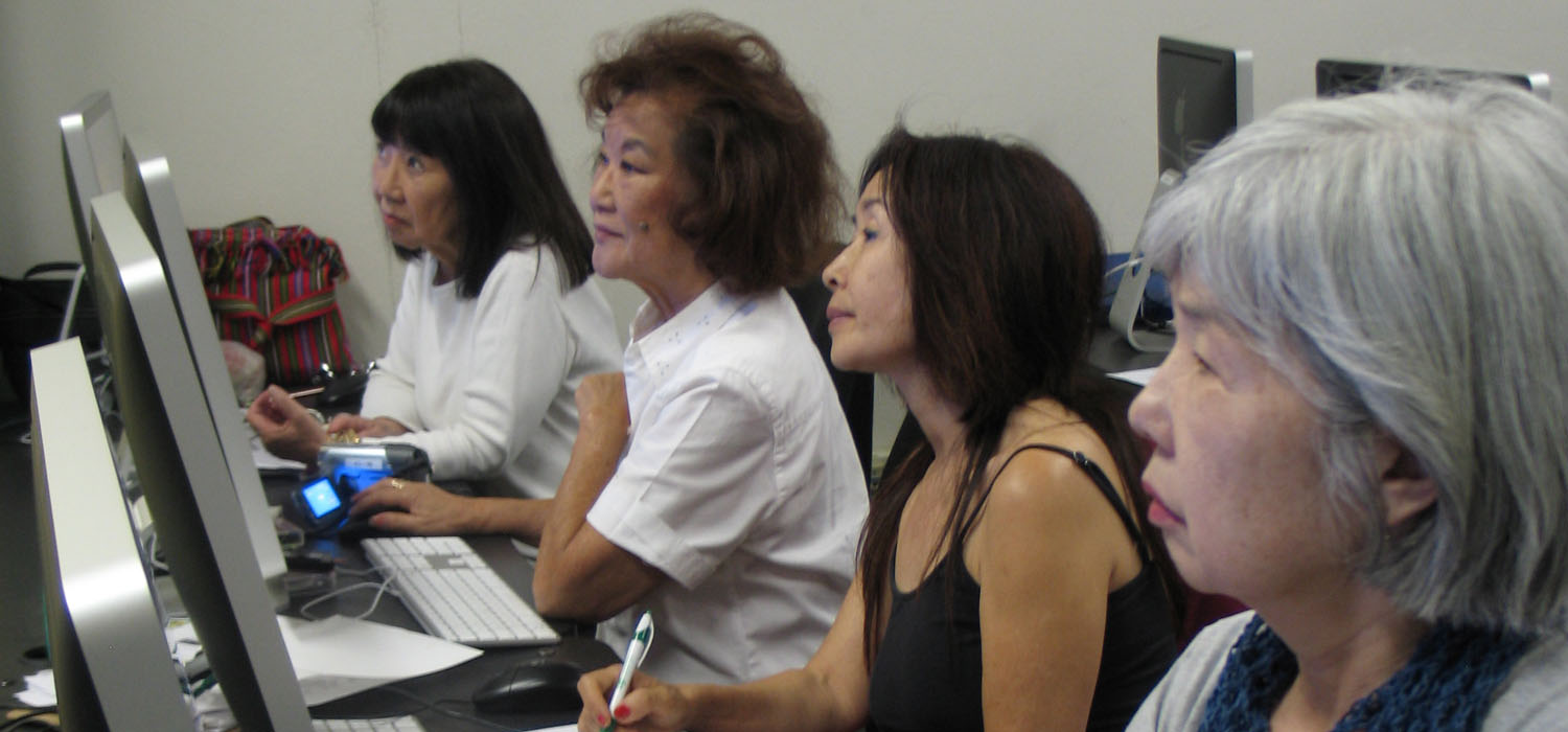 Never Too Old to Learn: director Michi Tanioka (second from left) and colleagues master the intricacies of non-linear digital editing at The Little Tokyo Service Center's DISKovery Center, the first home of the Digital Histories program. (Photo: Jeff Liu/Visual Communications Photographic Archive)