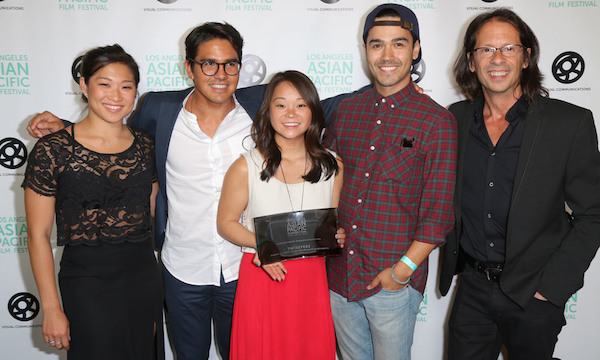 TWINSTERS WON THE GRAND JURY PRIZE FOR BEST DOCUMENTARY. FROM LEFT TO RIGHT: EXECUTIVE PRODUCER JENNA USHKOWITZ; DIRECTORS RYAN MIYAMOTO AND SAMANTHA FUTERMAN; PRODUCER KANOA GOO; EXECUTIVE PRODUCER JEFFREY CONSIGLIO. (PHOTO: STEVEN LAM)