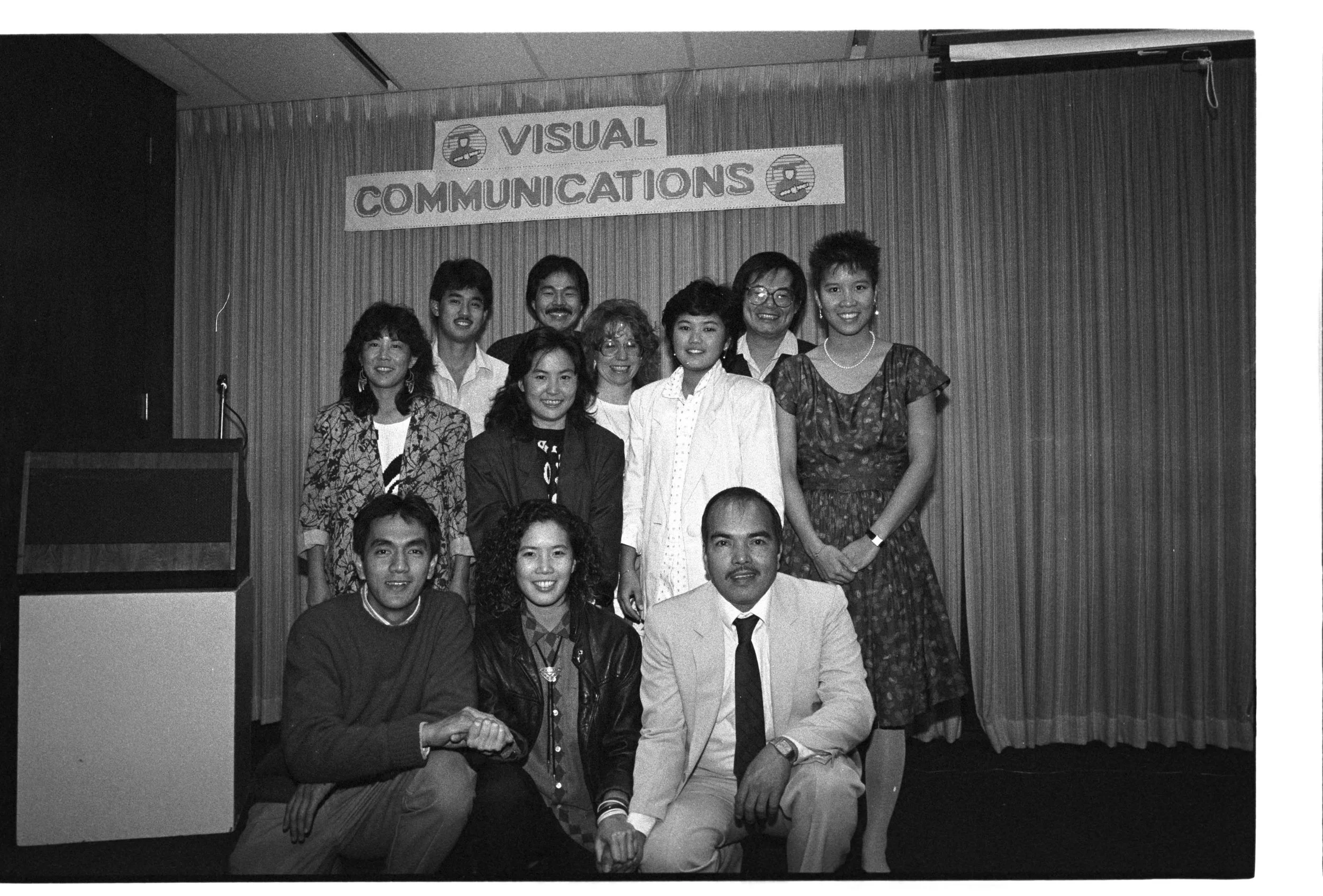 Group photo of Visual Communications staff and community members