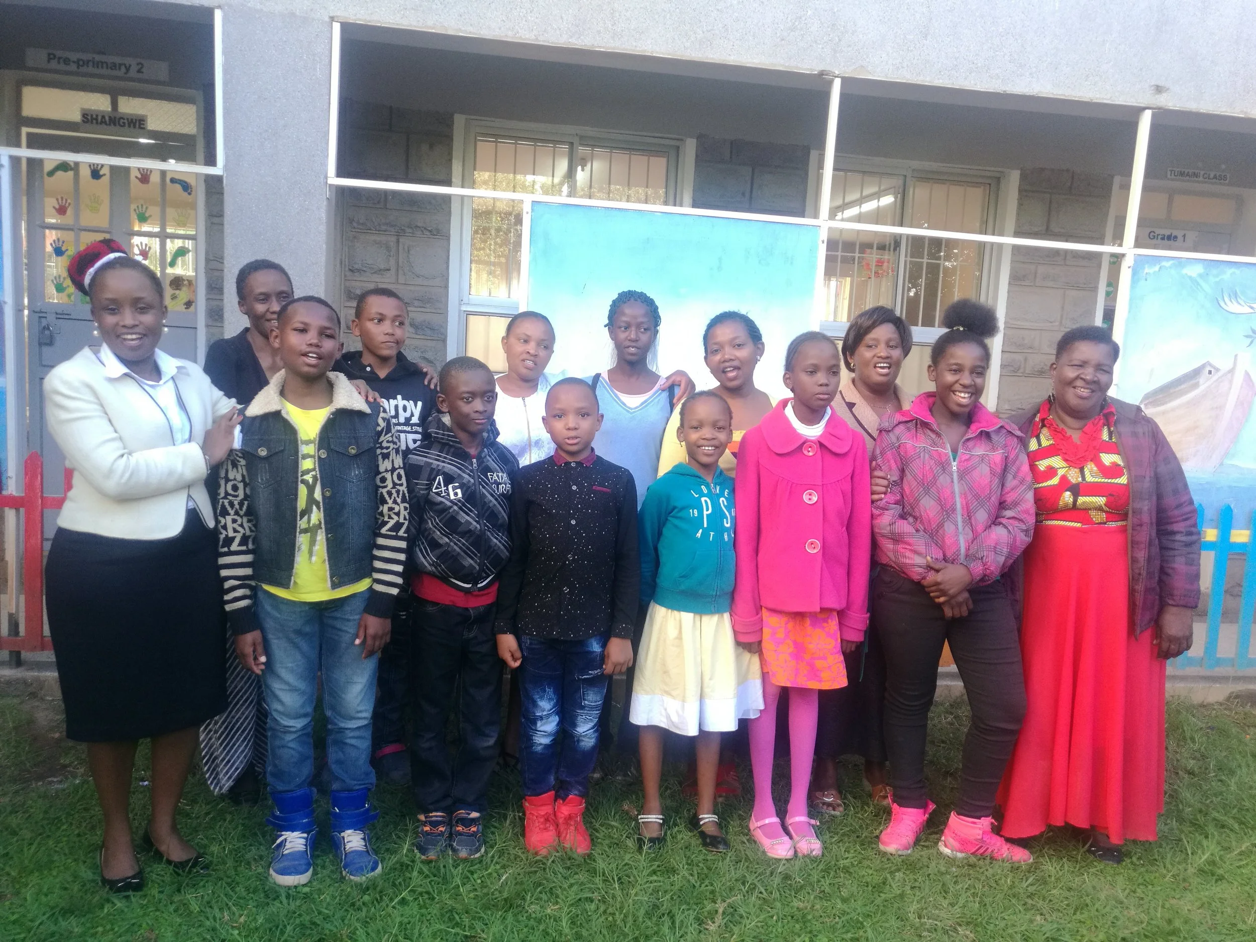 Some of the students and their mothers and guardians gather after first term.