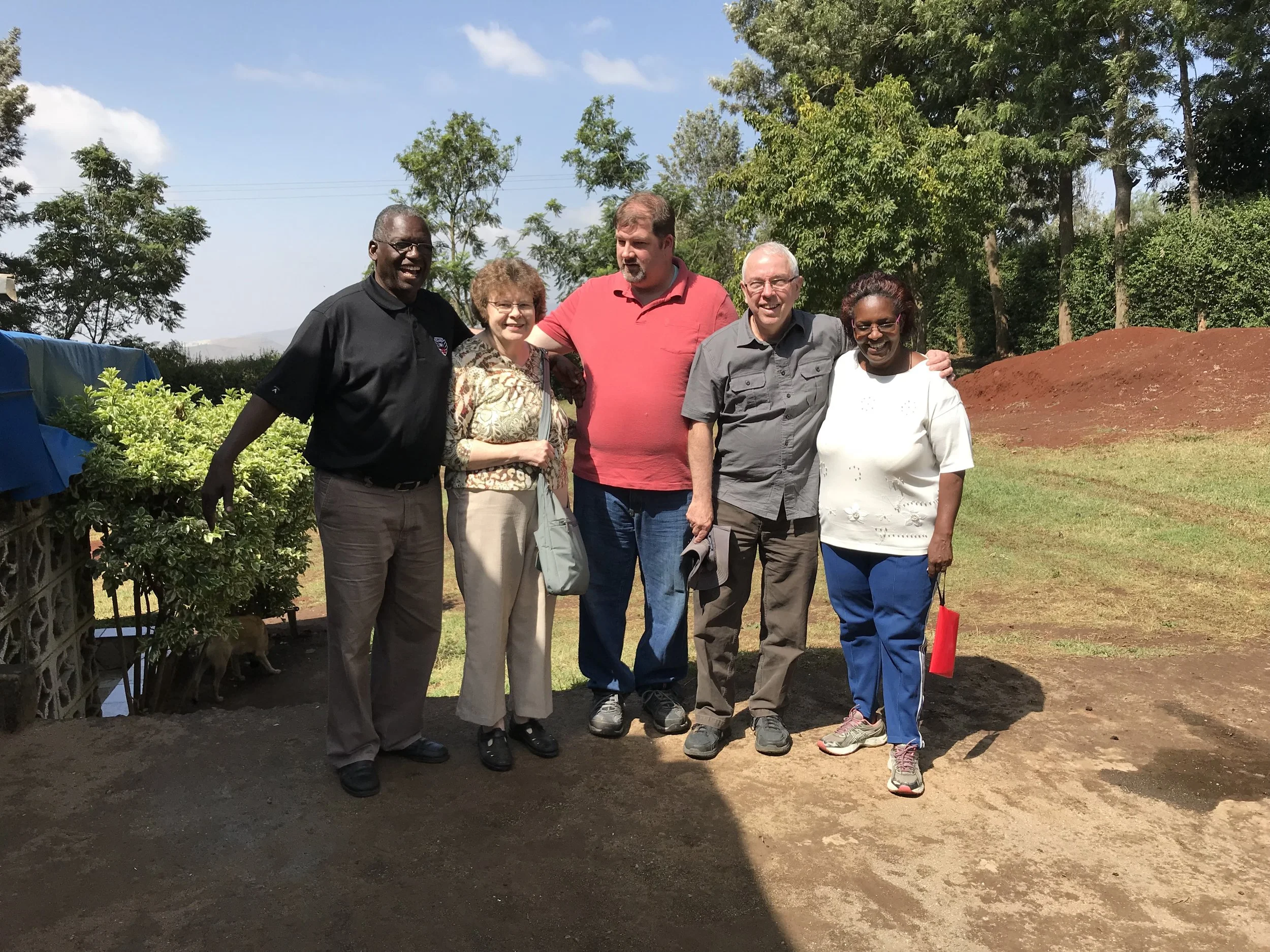 Side by Side representatives meet with founders of Tania Centre, Joseph and Jennifer Kigunda.