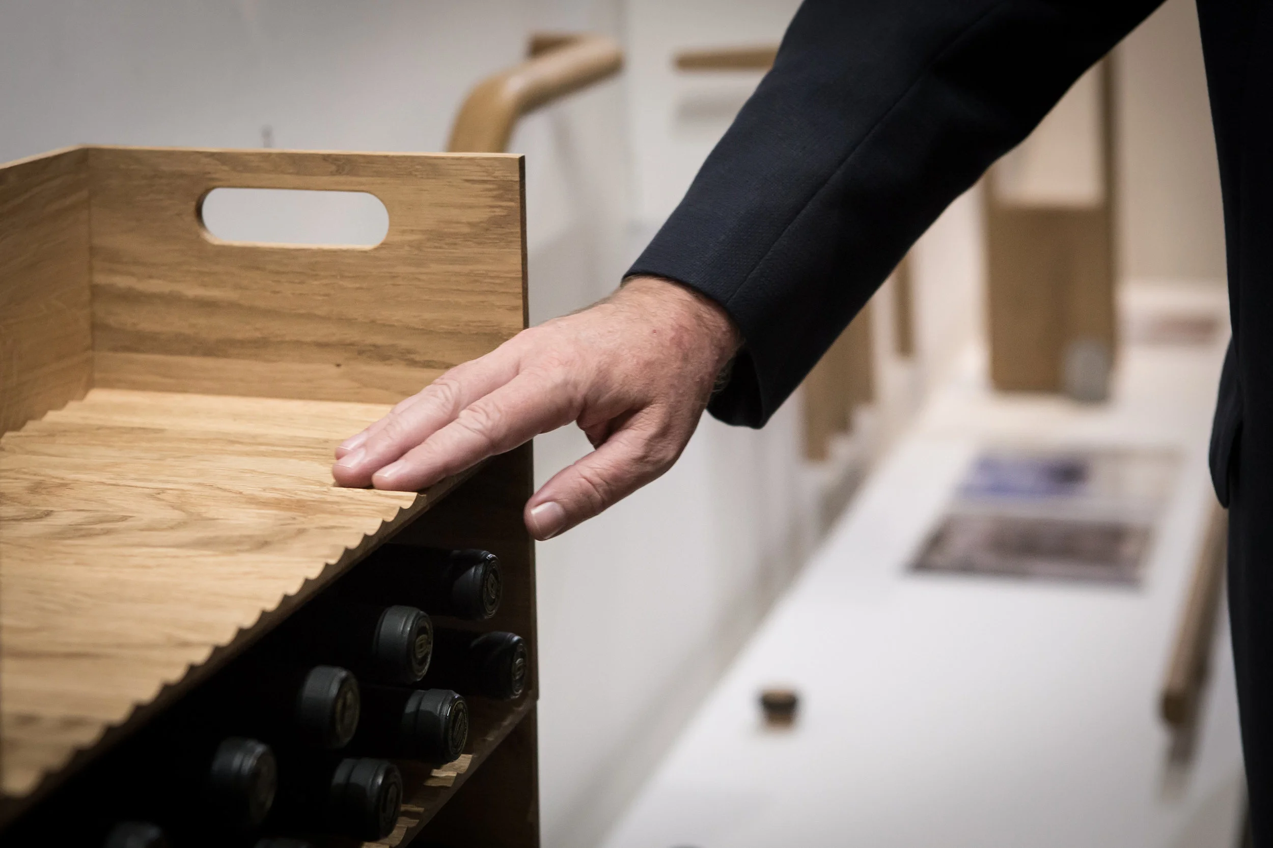 Wine Rack Grooves for Stacking Bottles Designed by Mowat and Company