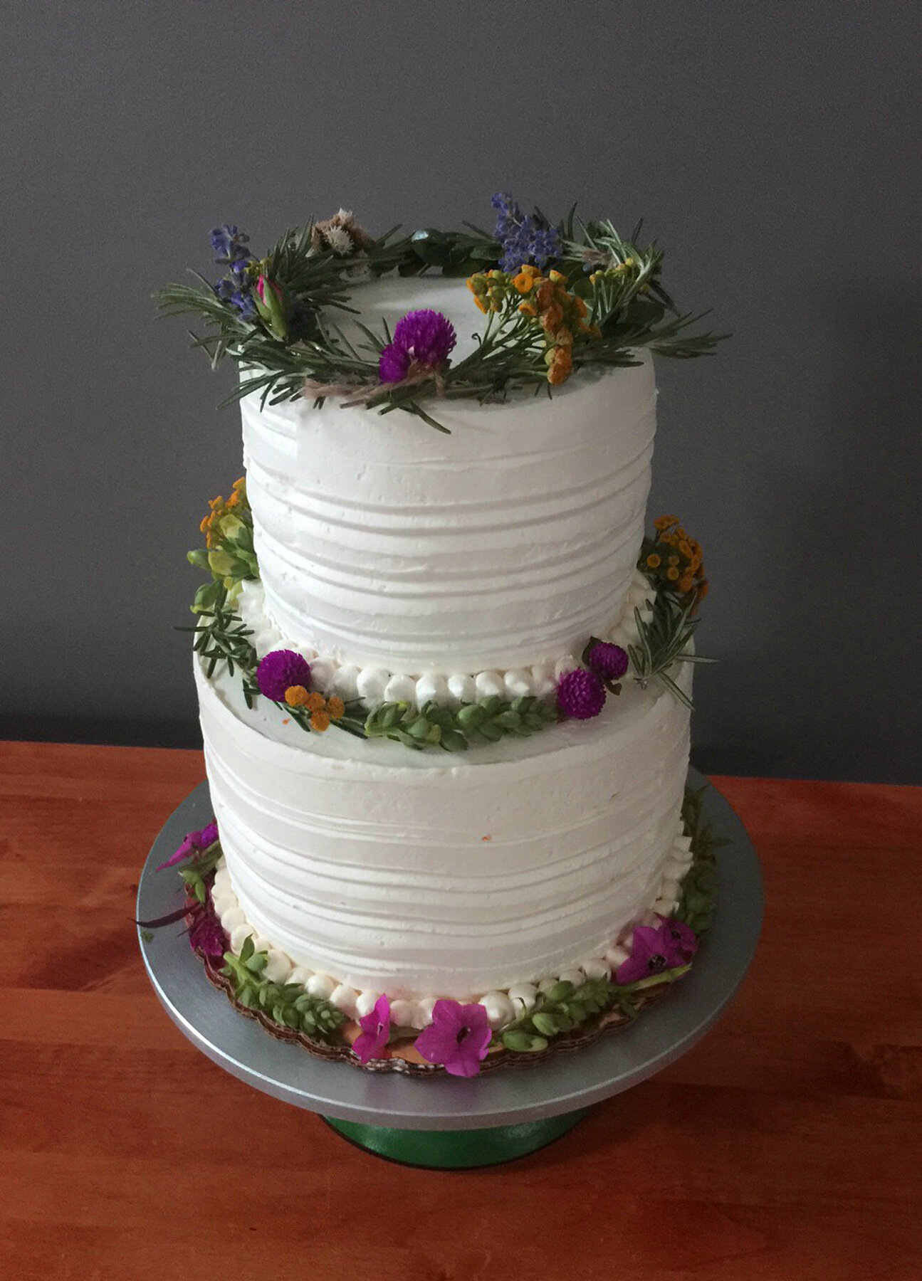 Studio-Sprig-three-tiered-cake-floral-wreaths2.jpg