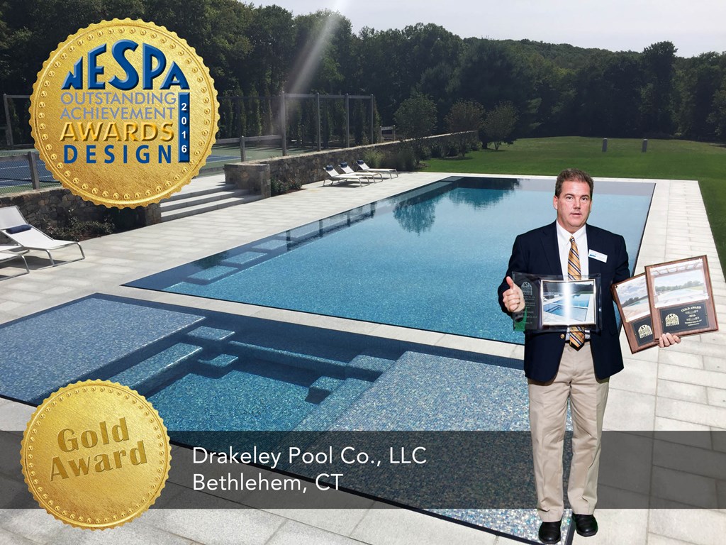 Bill Drakeley accepts THREE Gold Awards for this glass tiled, knife-edge beauty, fondly referred to as the "jewel of the property" by our client.