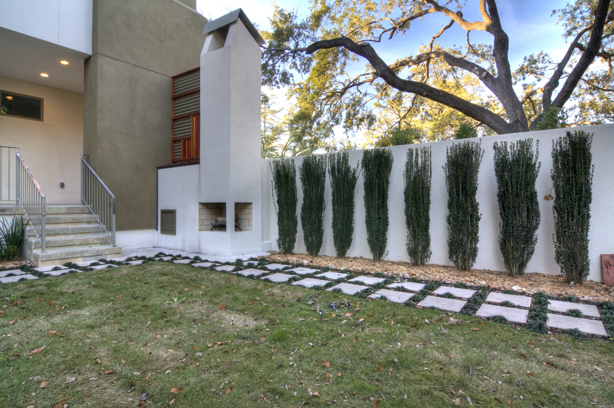 Chatham Lane - Exterior courtyard towards fireplace.jpg