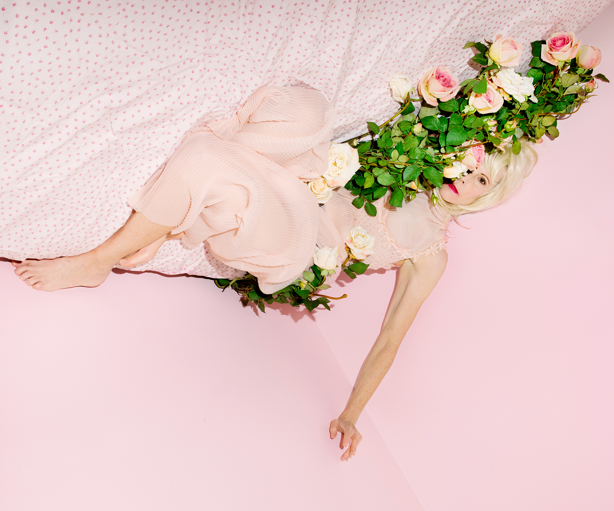   My Mother in Bed with Roses  