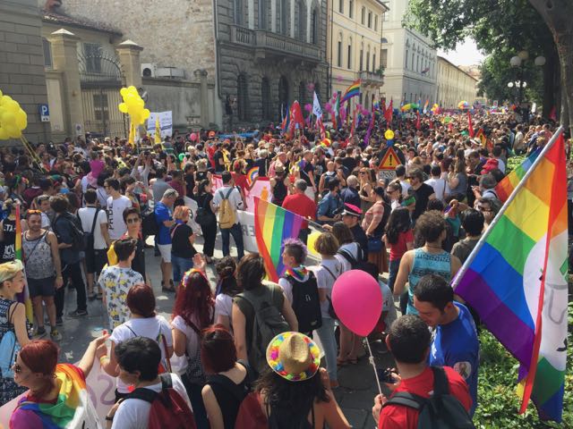 The crowd gathers in Piazza D'Azeglio at the start of the parade.