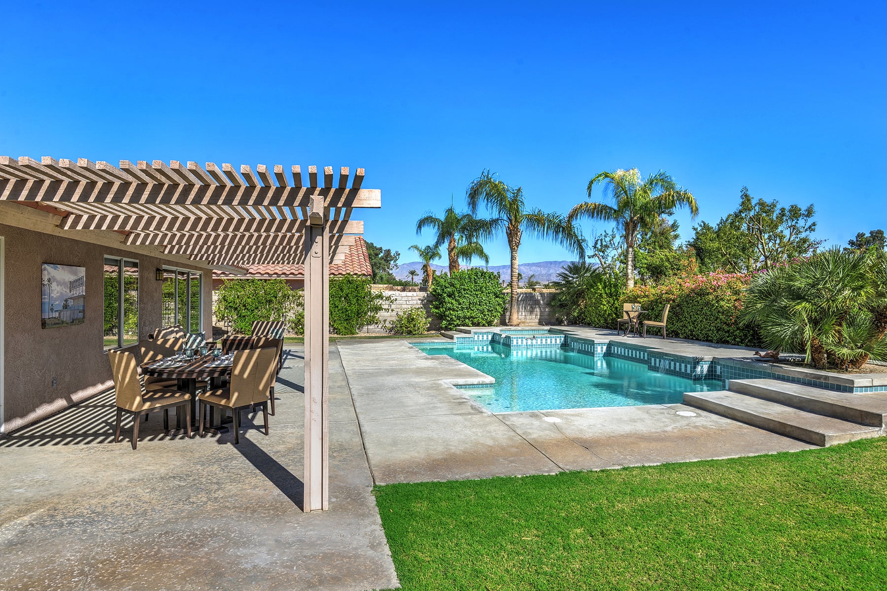 ACROSS BACKYARD AND POOL MLS.jpg