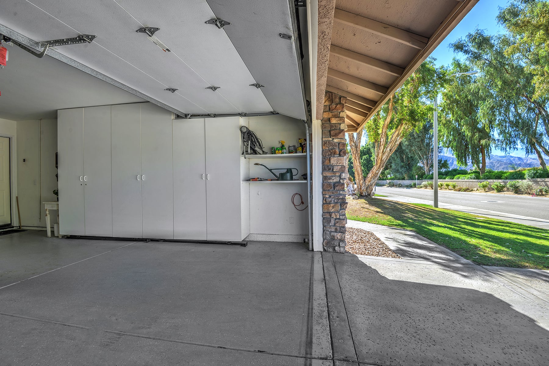 BUILT IN GARAGE CABINETS AND MOUNTAIN VIEWS MLS.jpg