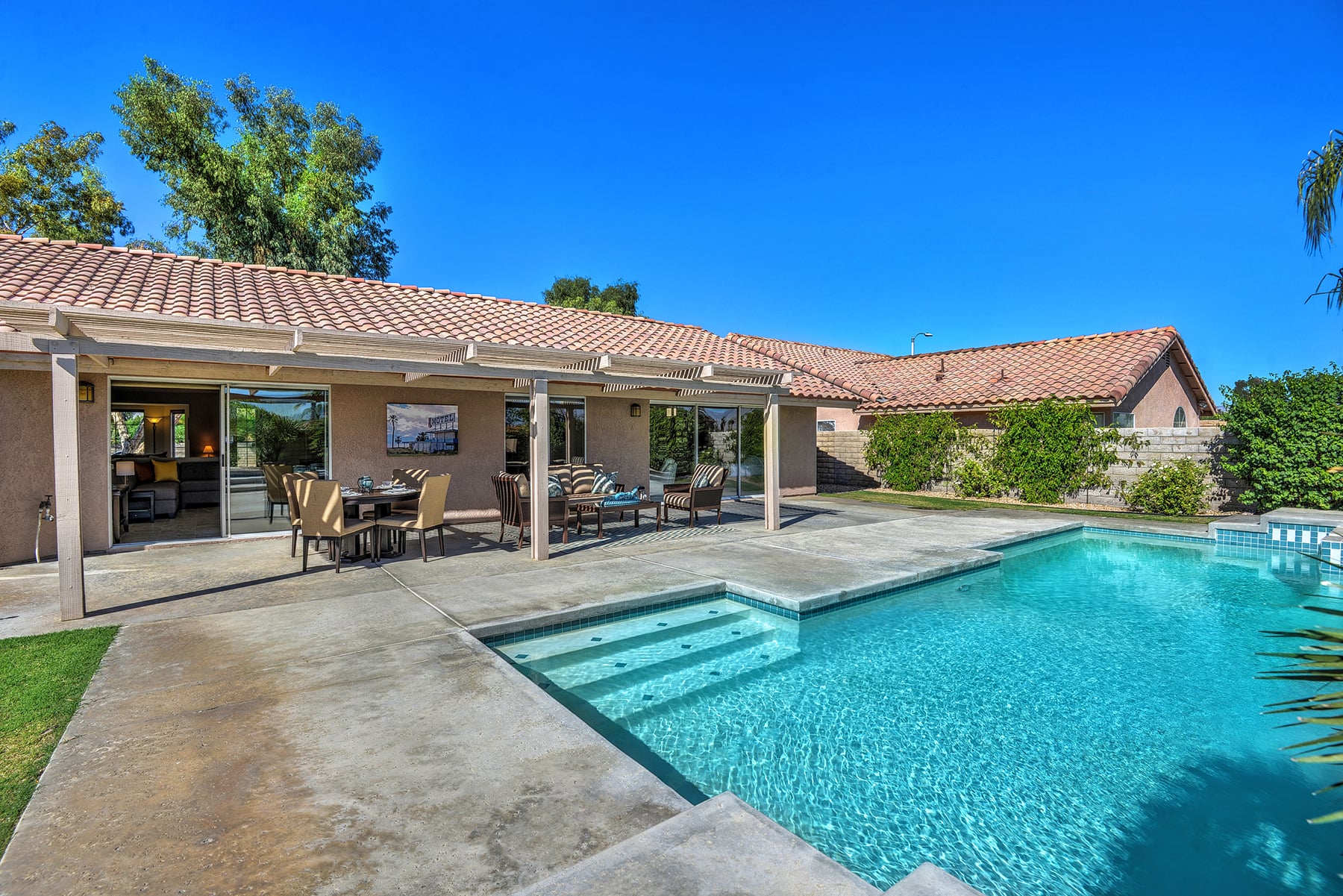 POOL AND BACK OF HOUSE MLS.jpg