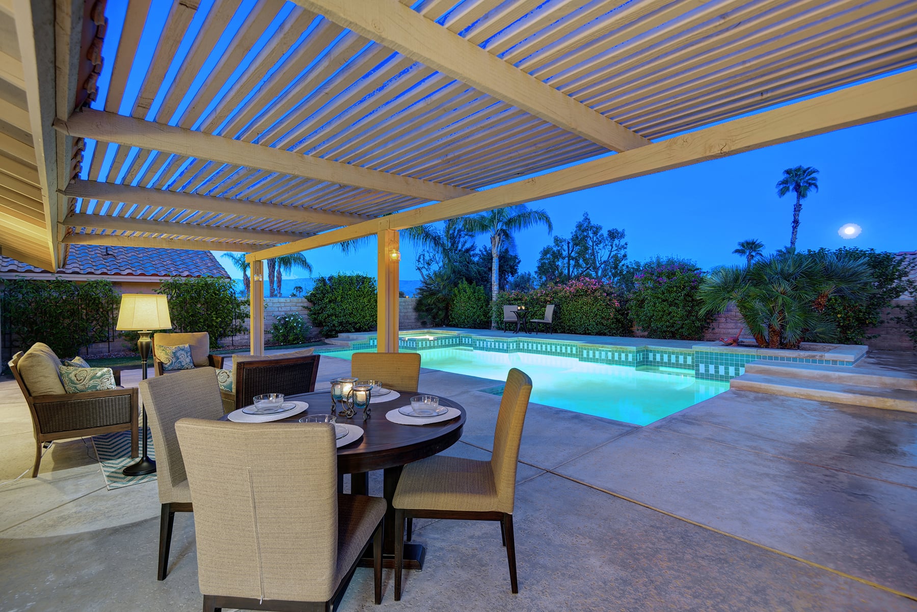 TRELISSED PATIO TO POOL NIGHT MLS.jpg