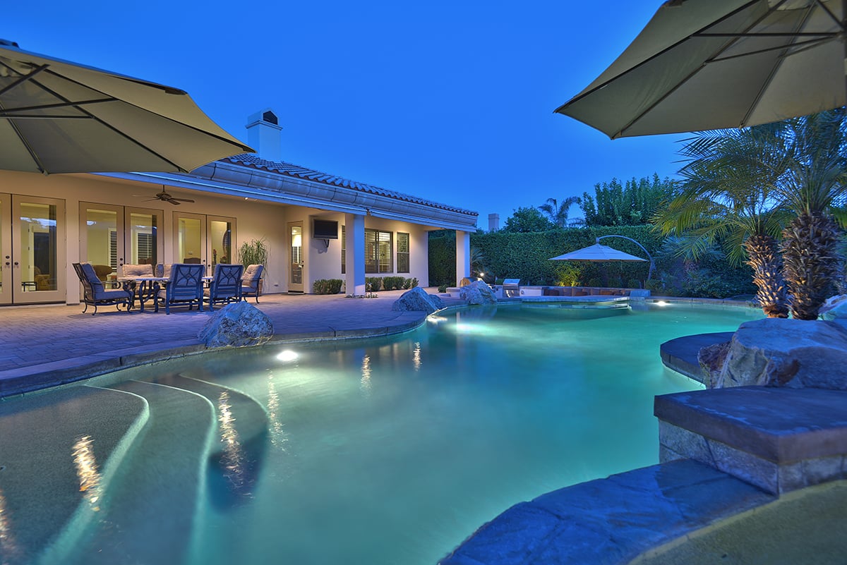 OVER SPA AND POOL TO HOUSE NIGHT MLS.jpg