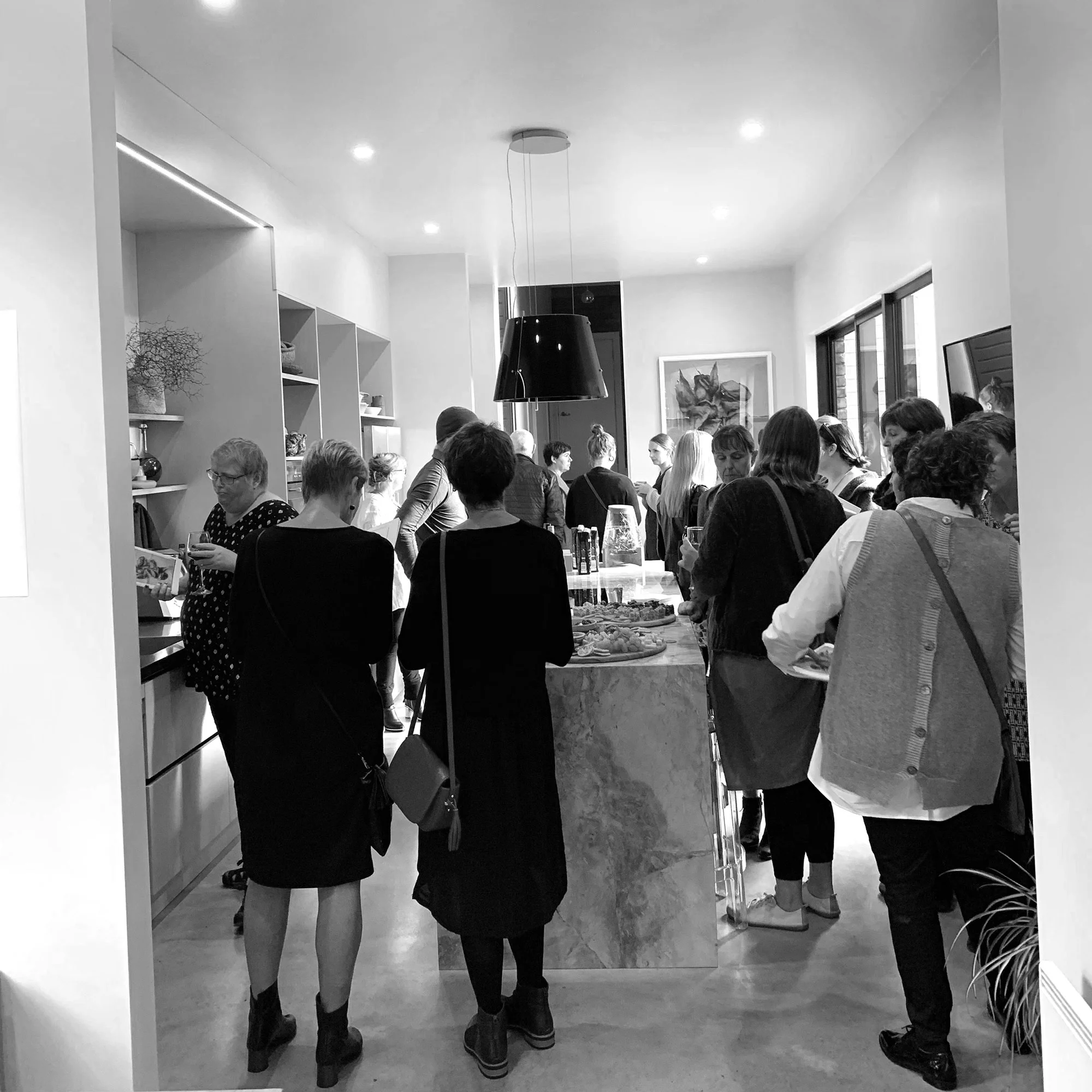 Some of the wonderful people who came to Tenderness enjoying the kitchen vibes.