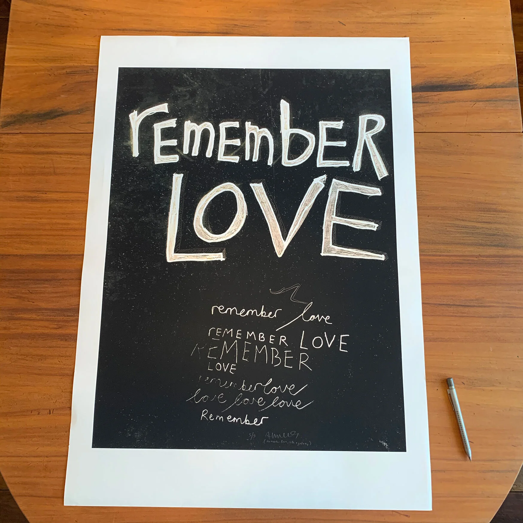 Remember-love-A0-print-on-table-web.jpg