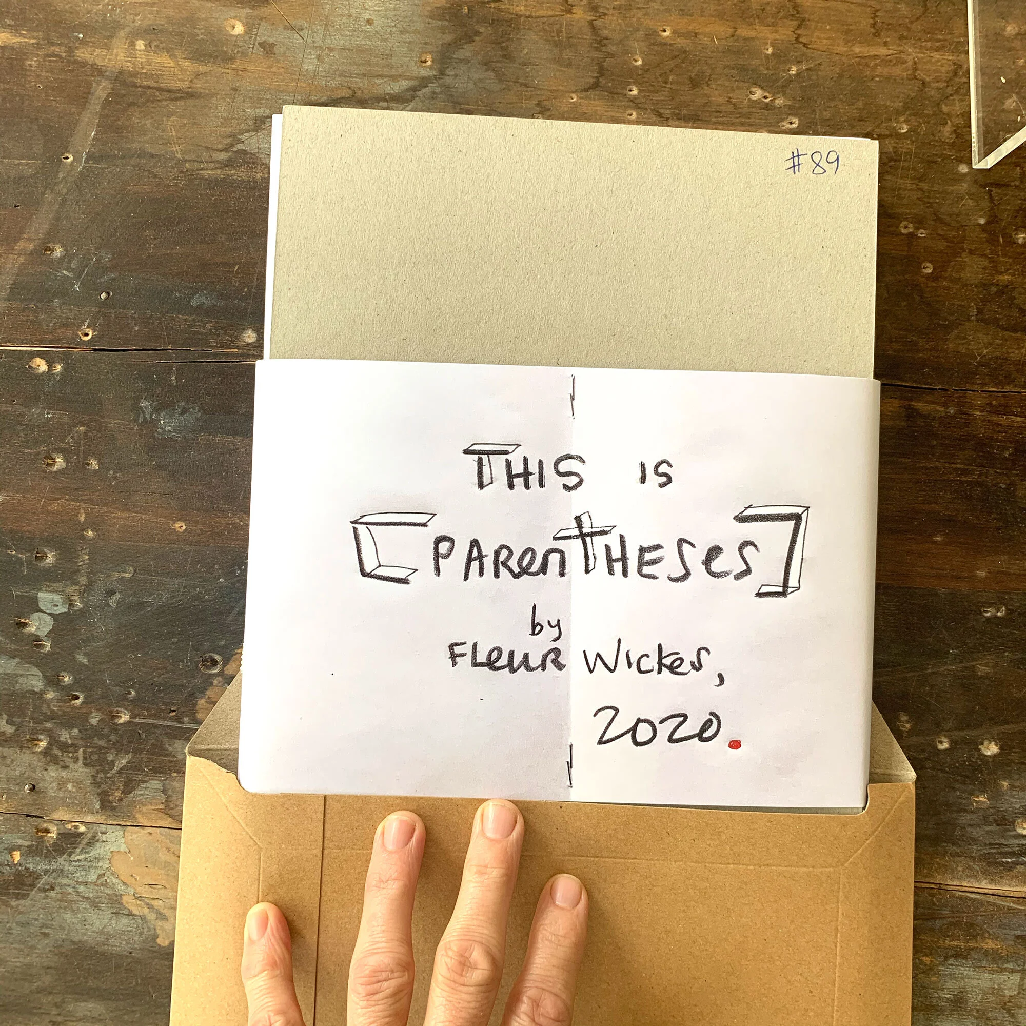 parentheses-half-out-of-package-web.jpg