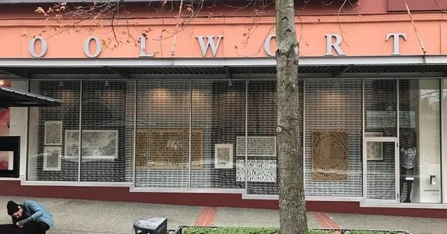Blake Carter's work, 38,971 Pedestrians , as seen through the Woolworth windows.