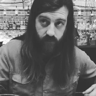 Jason Heminger is a musician, painter, and magic maker. You can find him running around Alma Mater with a hammer or yellow sketchpad, depending on the day.